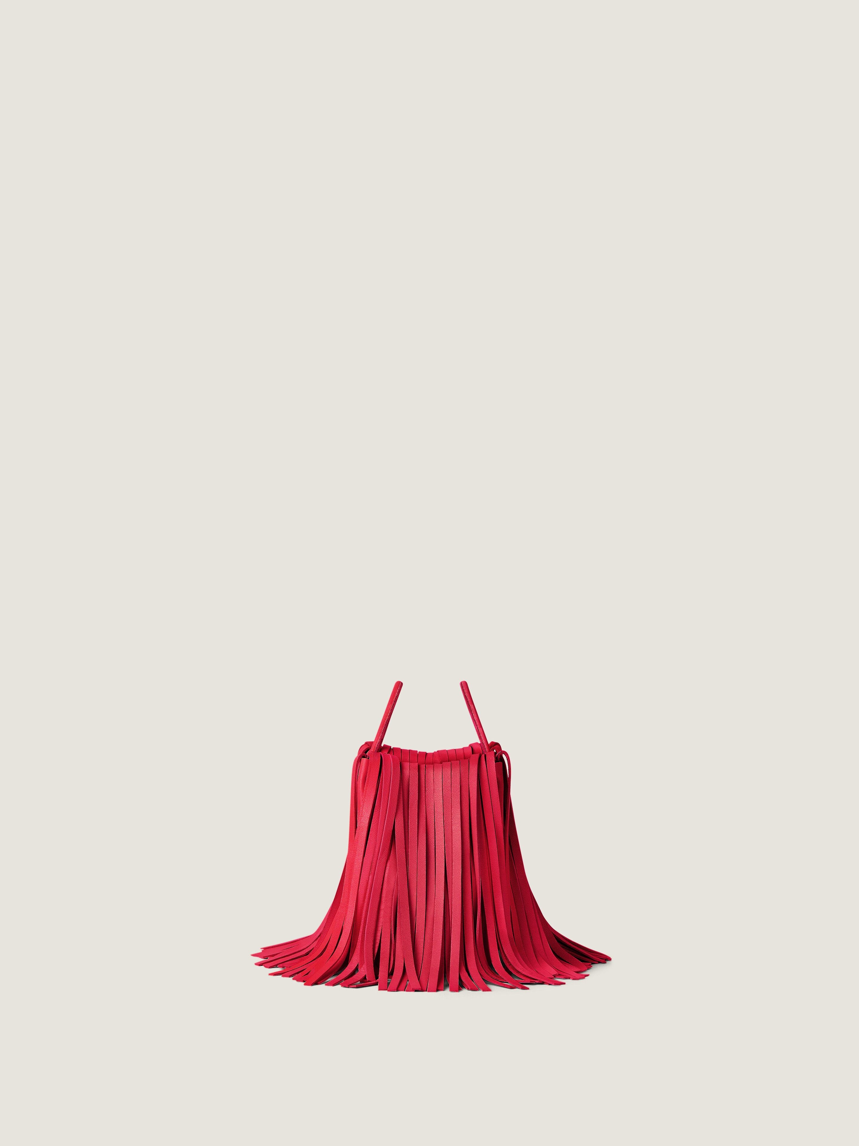 Nano Facet tote bag in leather with fringes in - equestrian red