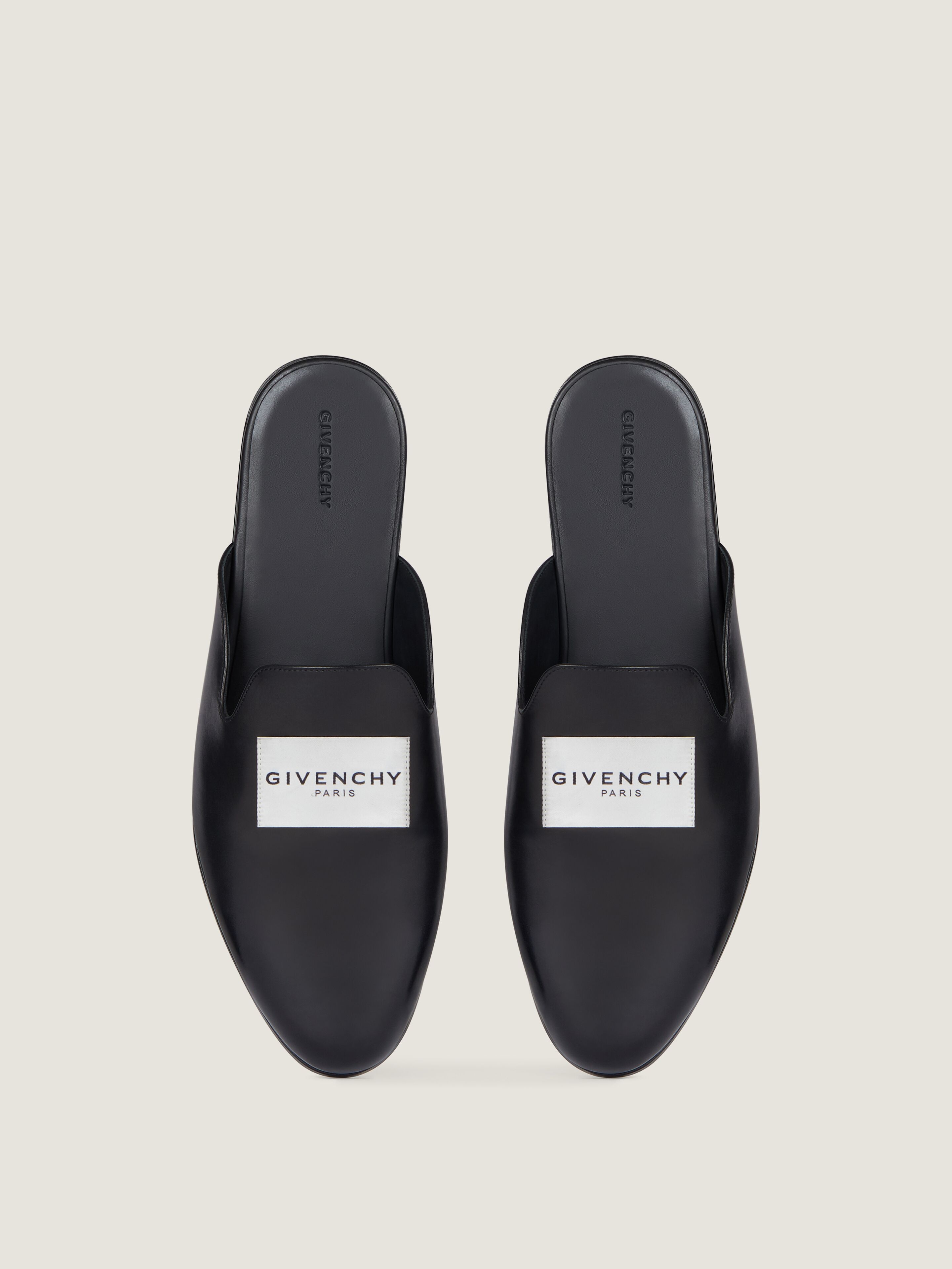 Label flat mules in leather in - black | Givenchy