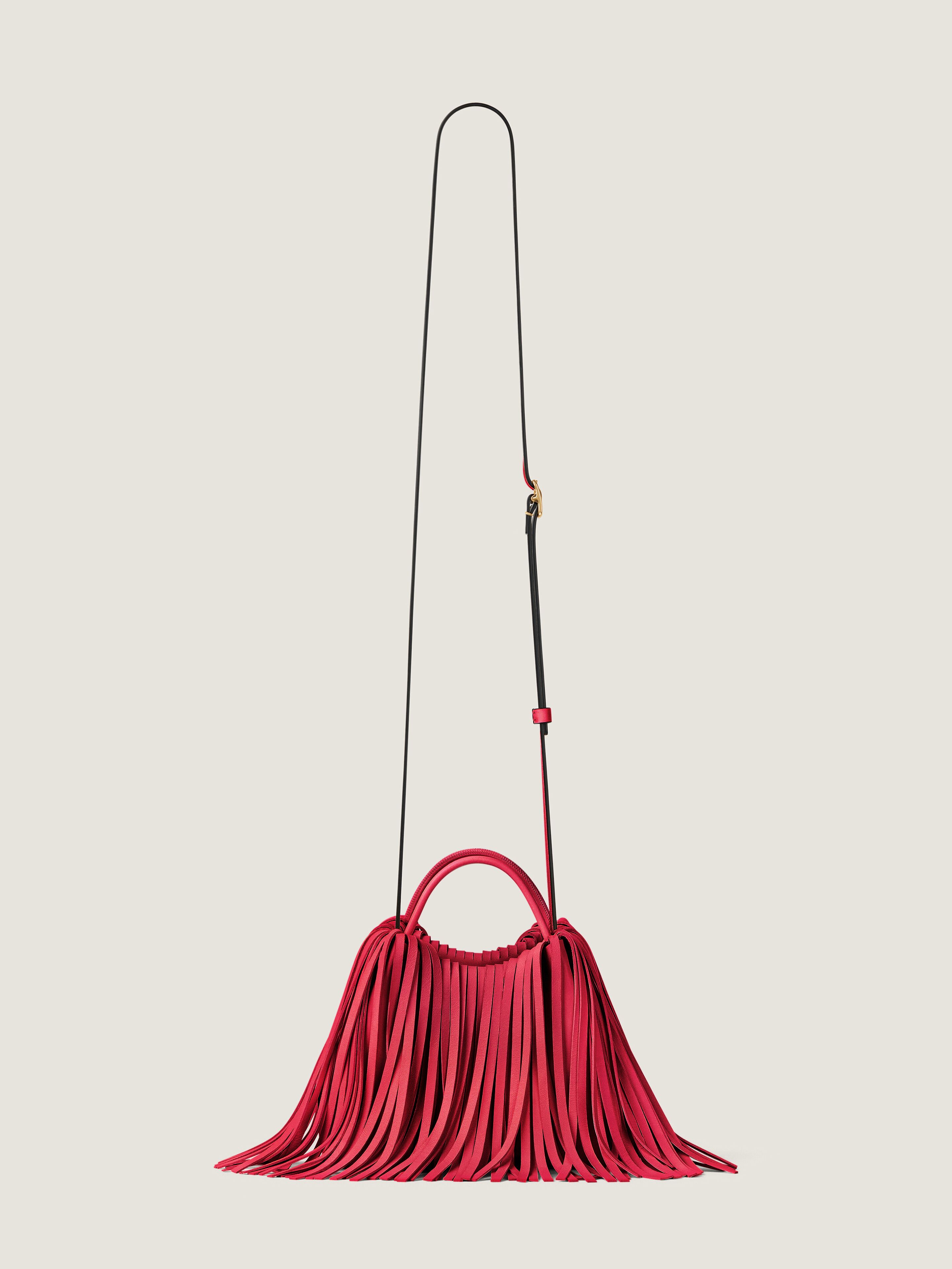 Nano Facet tote bag in leather with fringes in - equestrian red