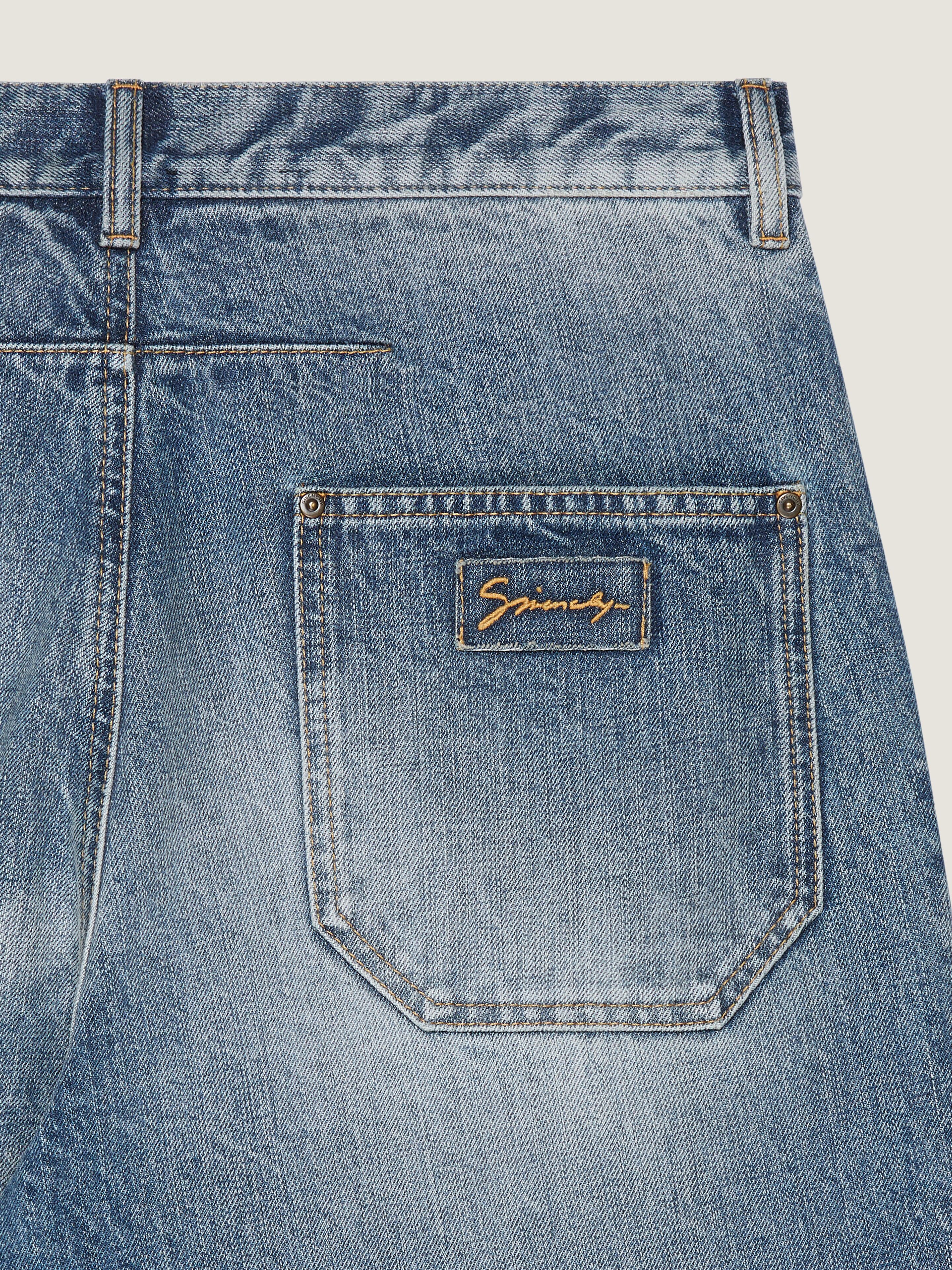 Loose fit jeans in washed denim | Givenchy CA | Givenchy