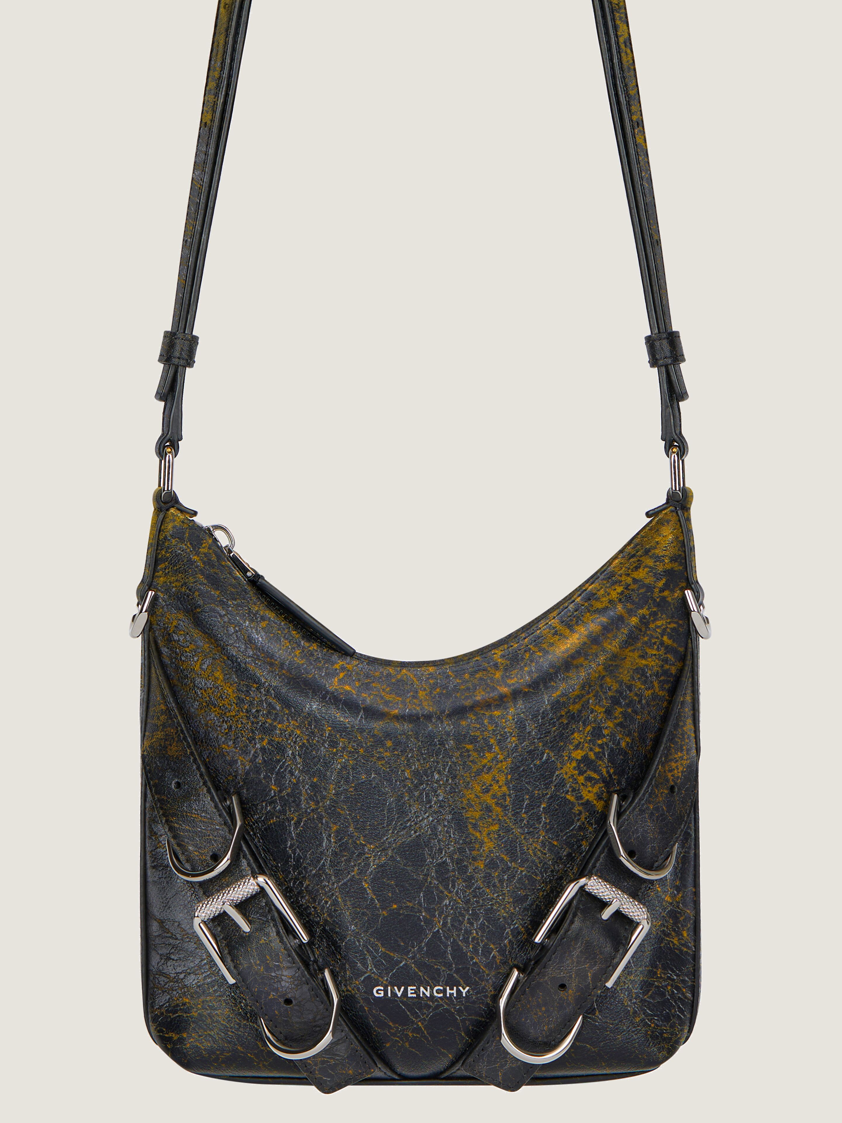 Small Voyou Crossbody bag in crackled leather in - black