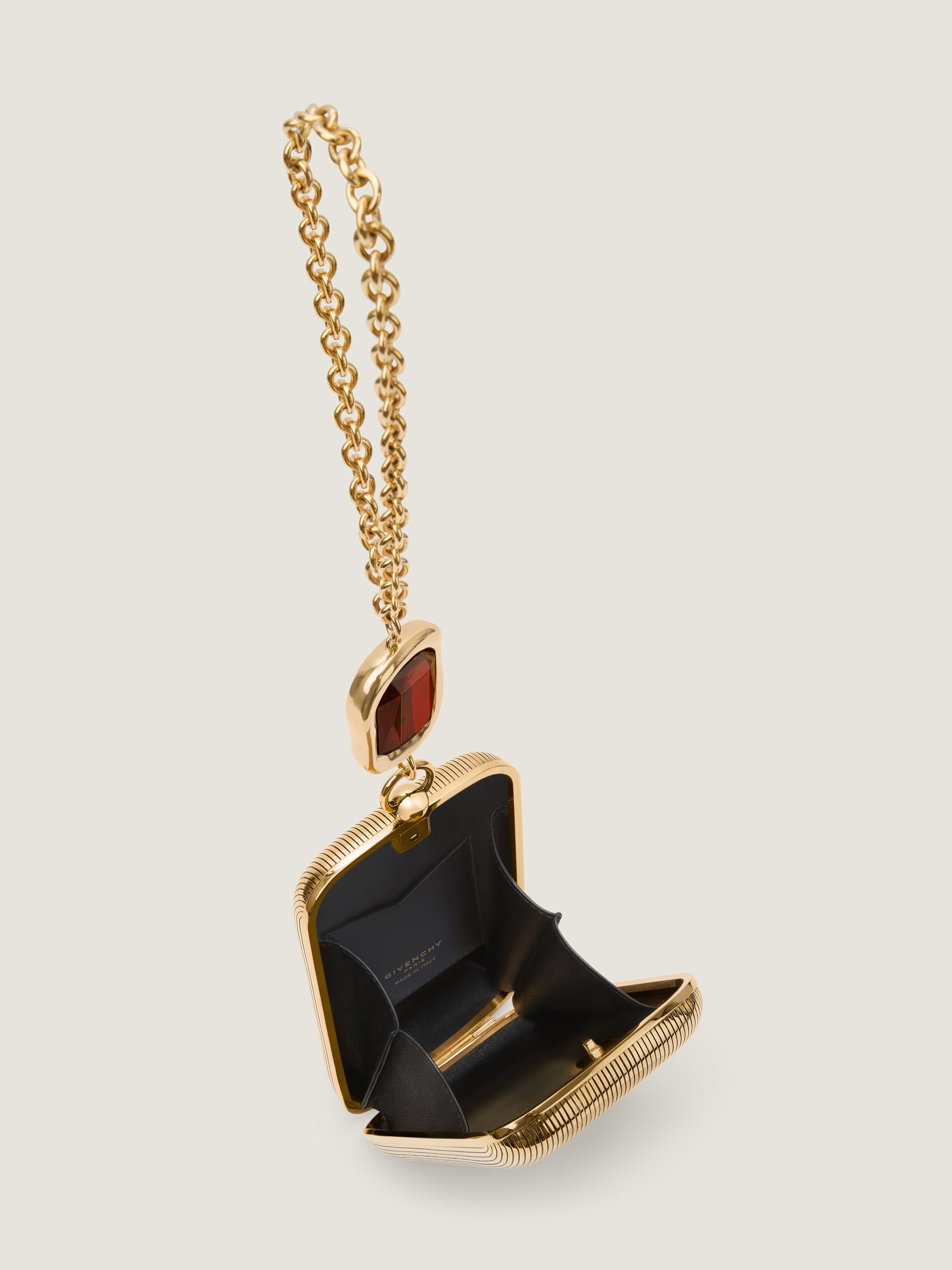 Evening clutch in metal with crystal jewel in - golden