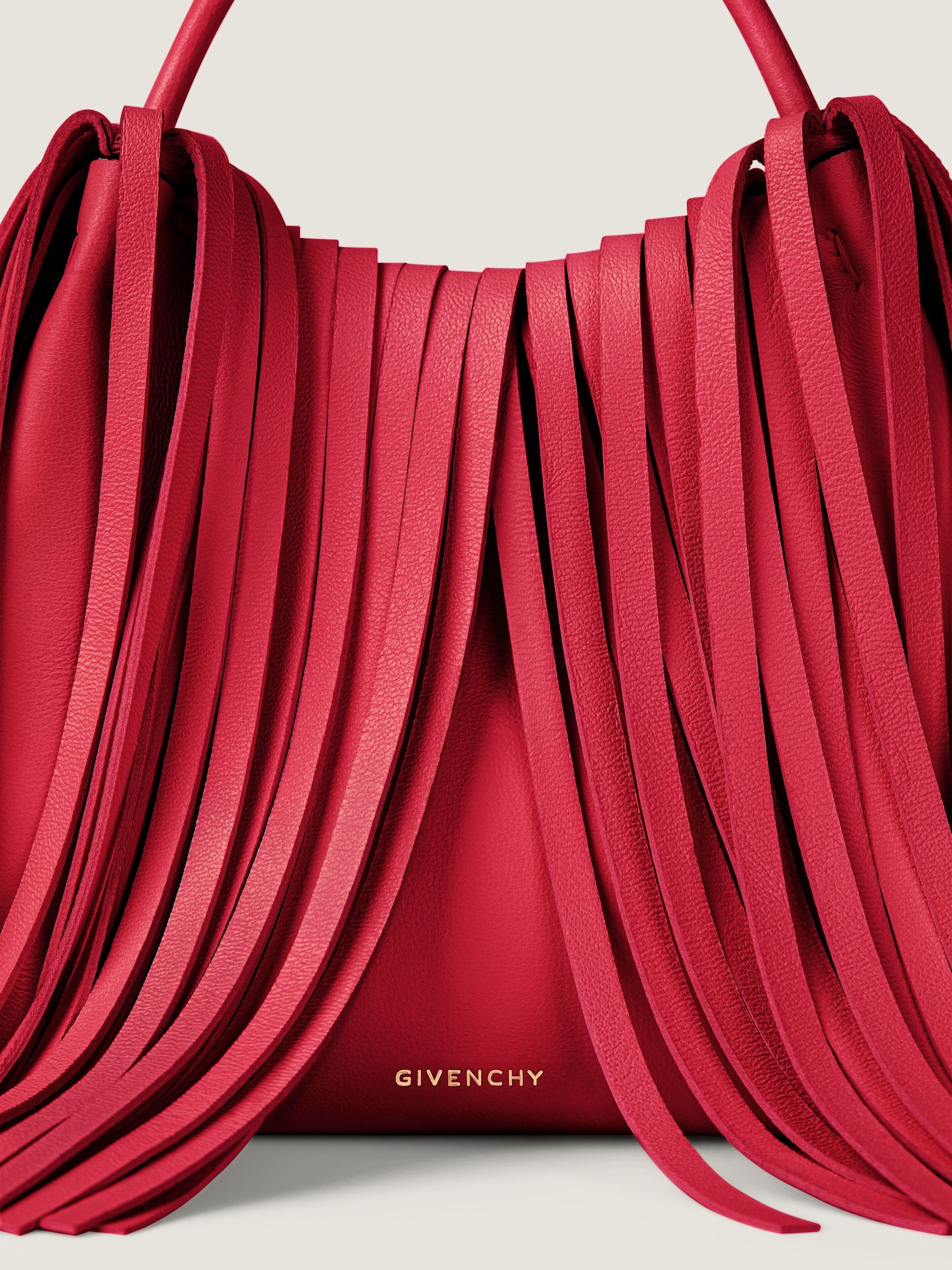 Nano Facet tote bag in leather with fringes in - equestrian red 
