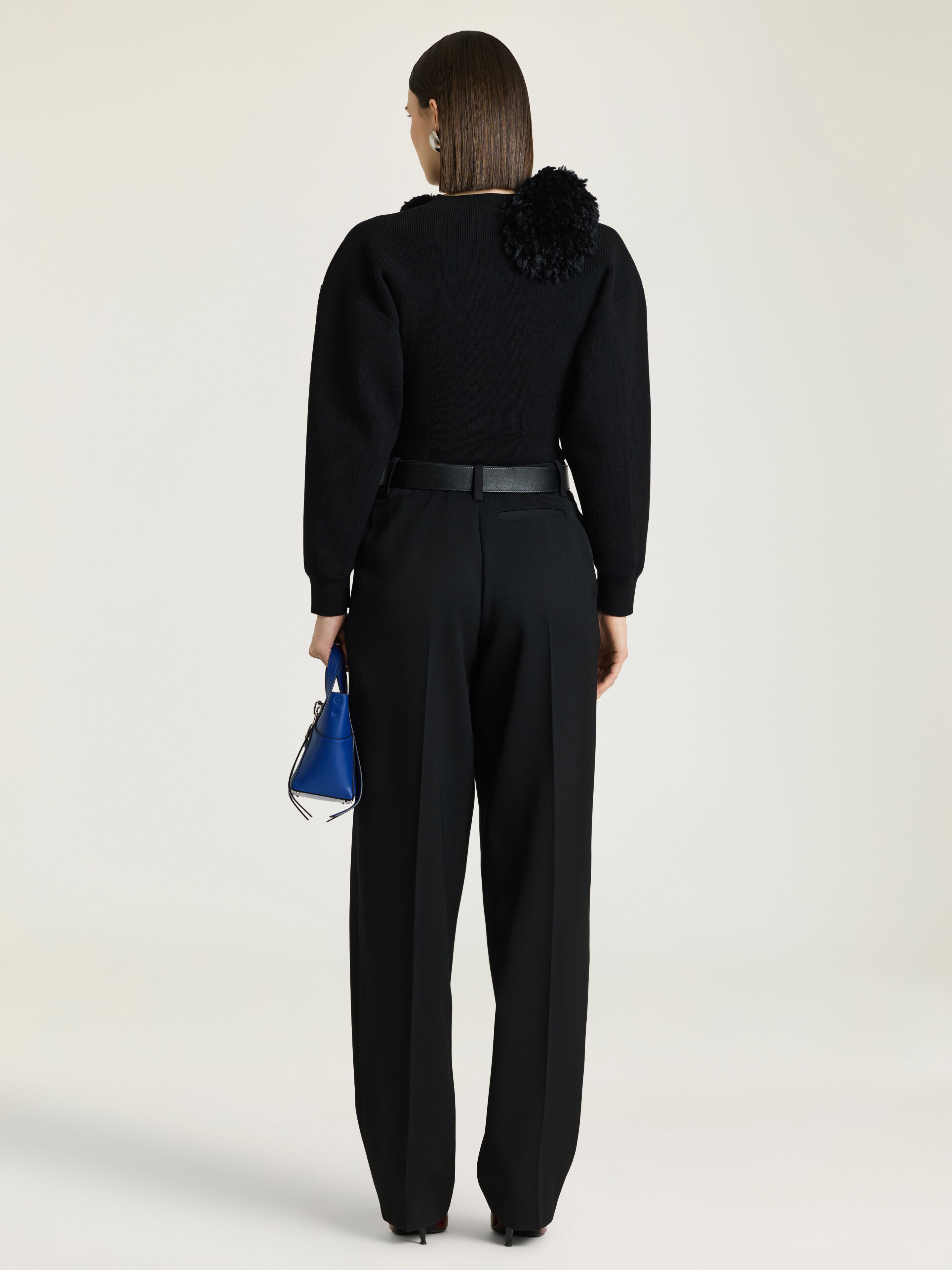 Asymmetric sweater in wool with pompoms in - black - BW90XC4ZVY
