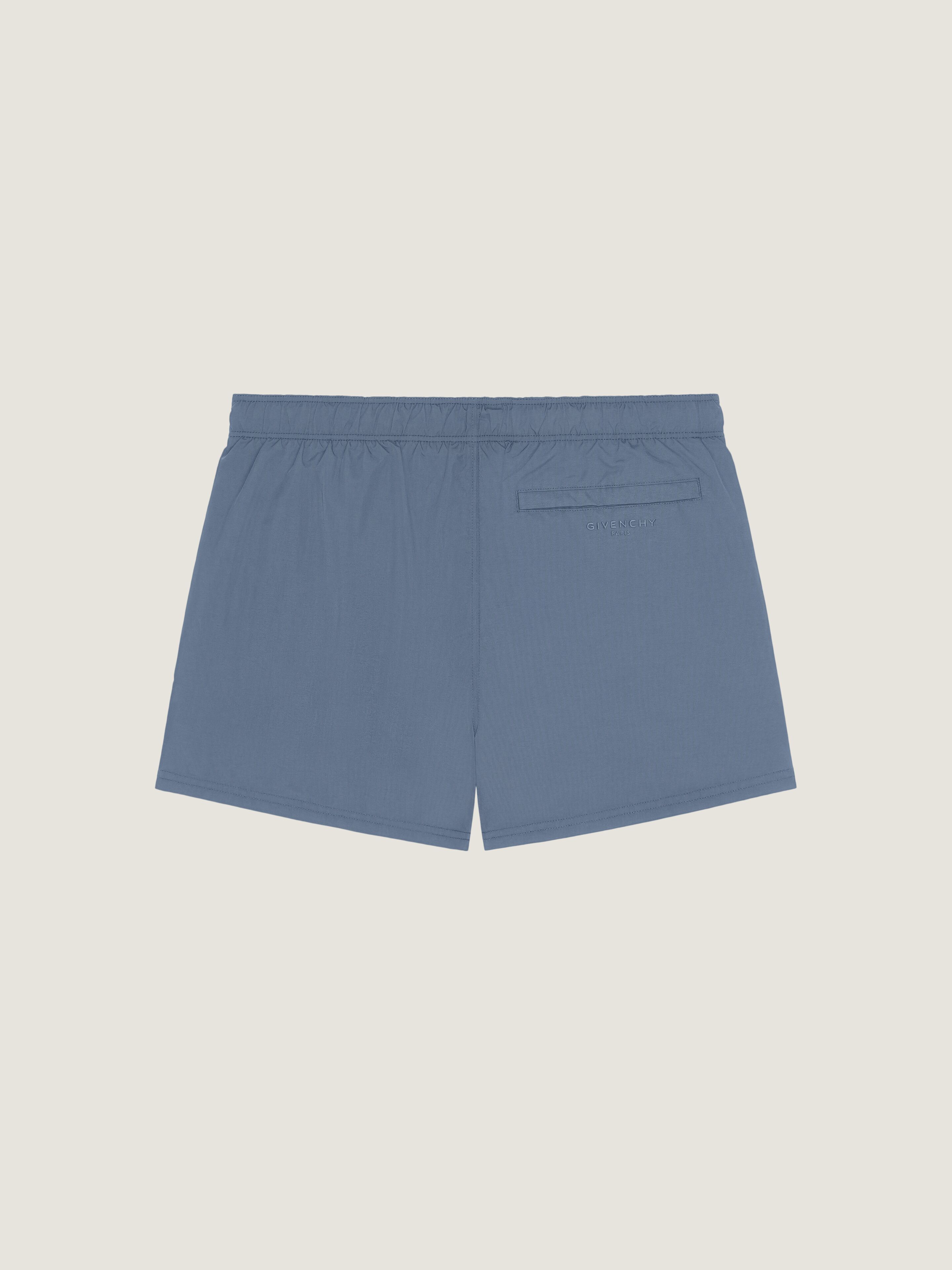 Swim shorts with Givenchy Paris embroidery in - military blue