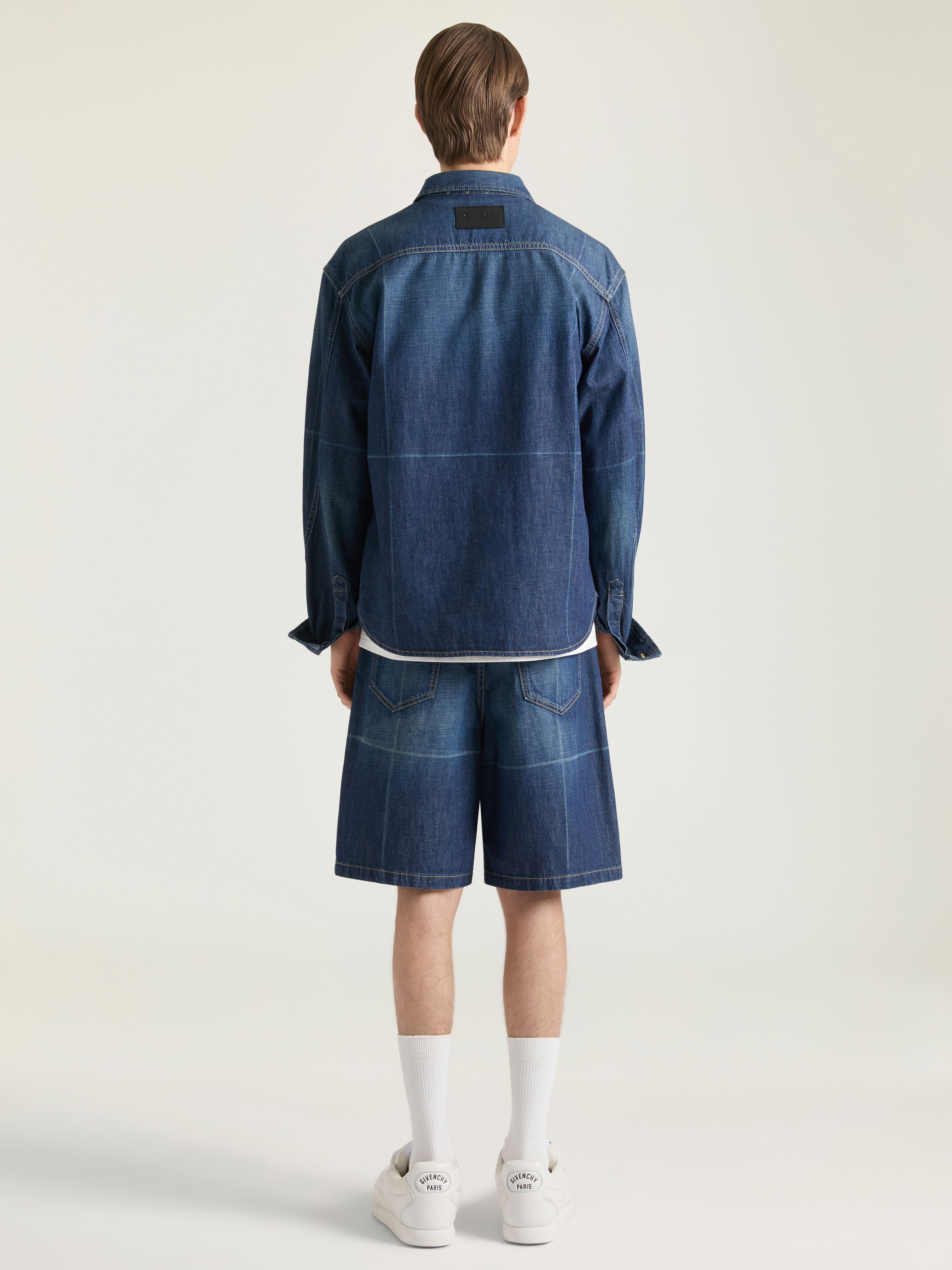 Shirt in indigo blue denim with folded effect | Givenchy DE | Givenchy