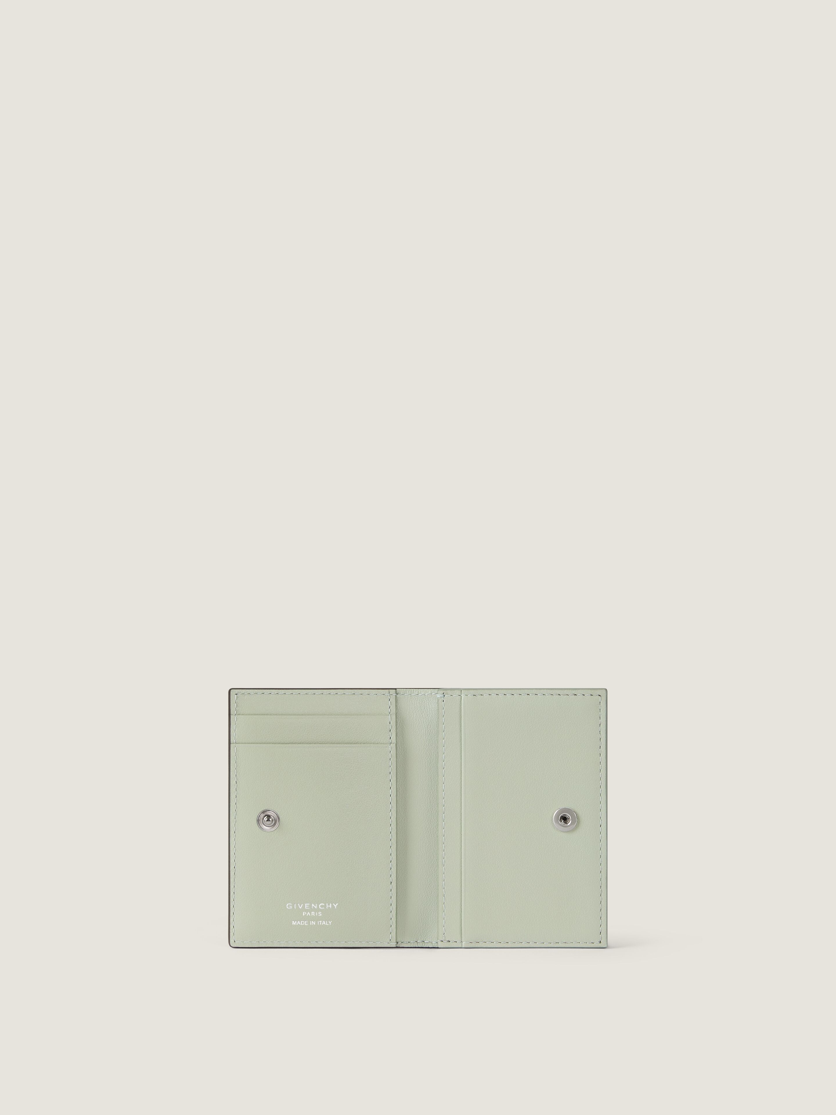 Antigona Stamped bicolor flap card holder in leather in - green