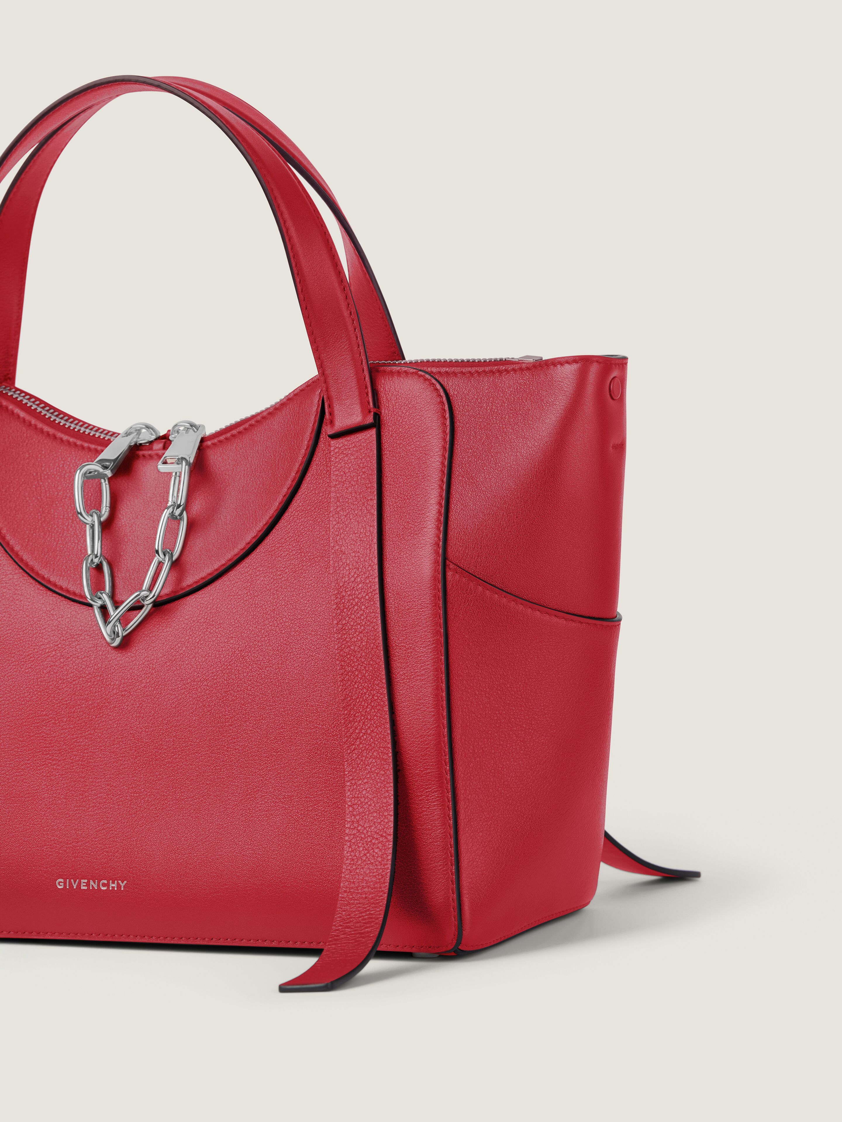 Medium The Snatch bag in grained leather in - equestrian red