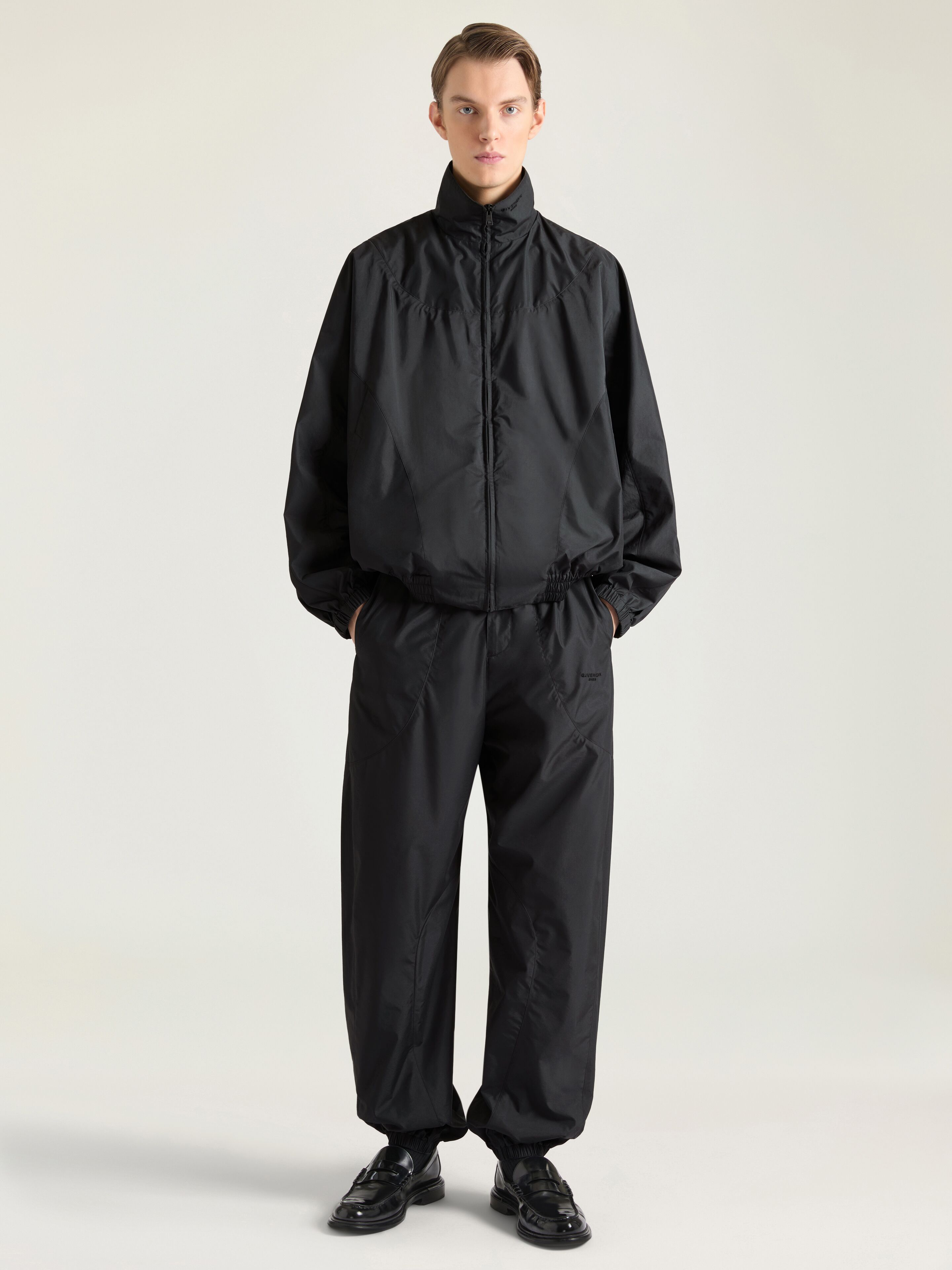 Couture Seam track top with cut-outs details in - black