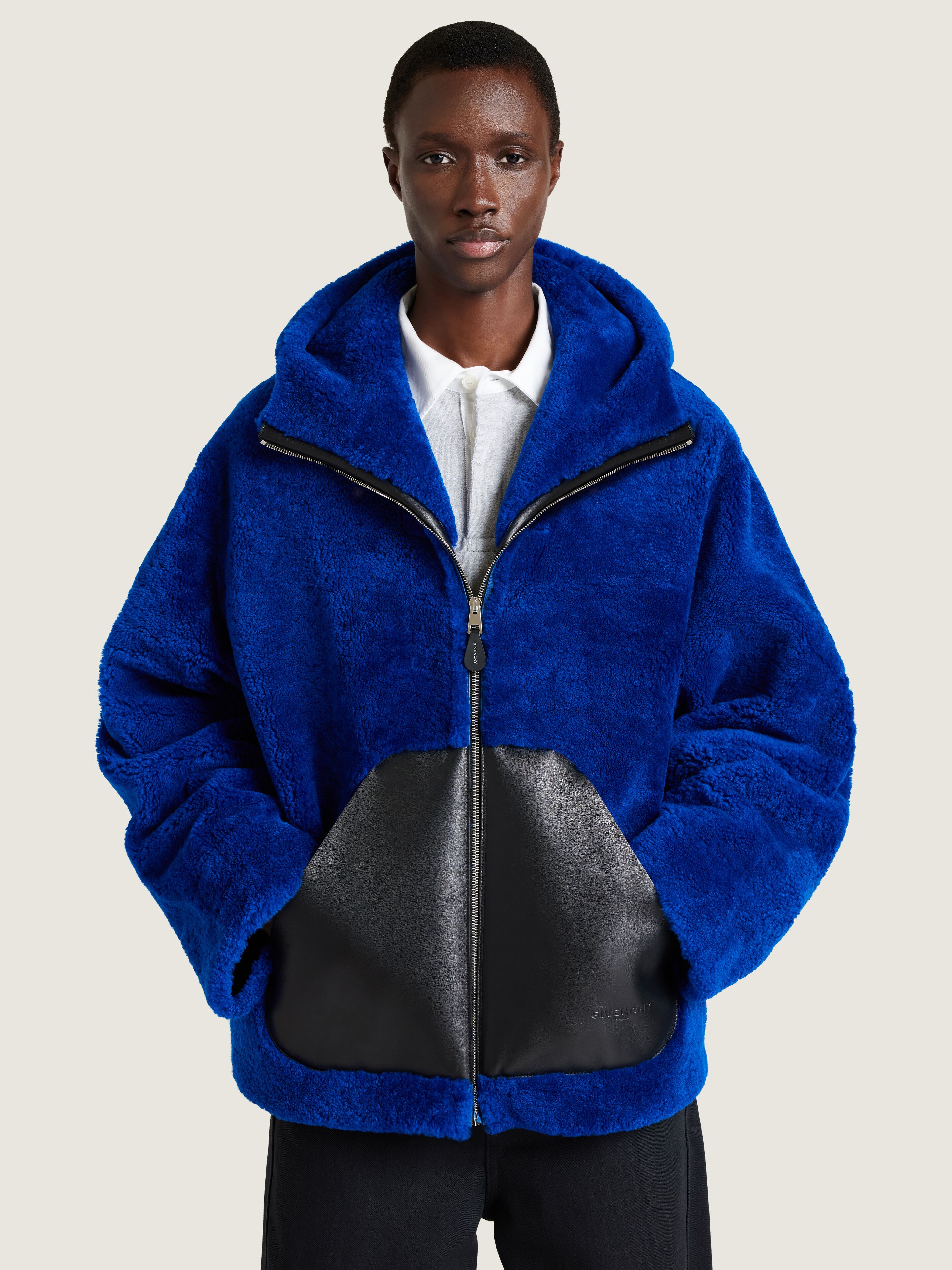 Zipped hoodie in shearling with leather pocket | Givenchy US