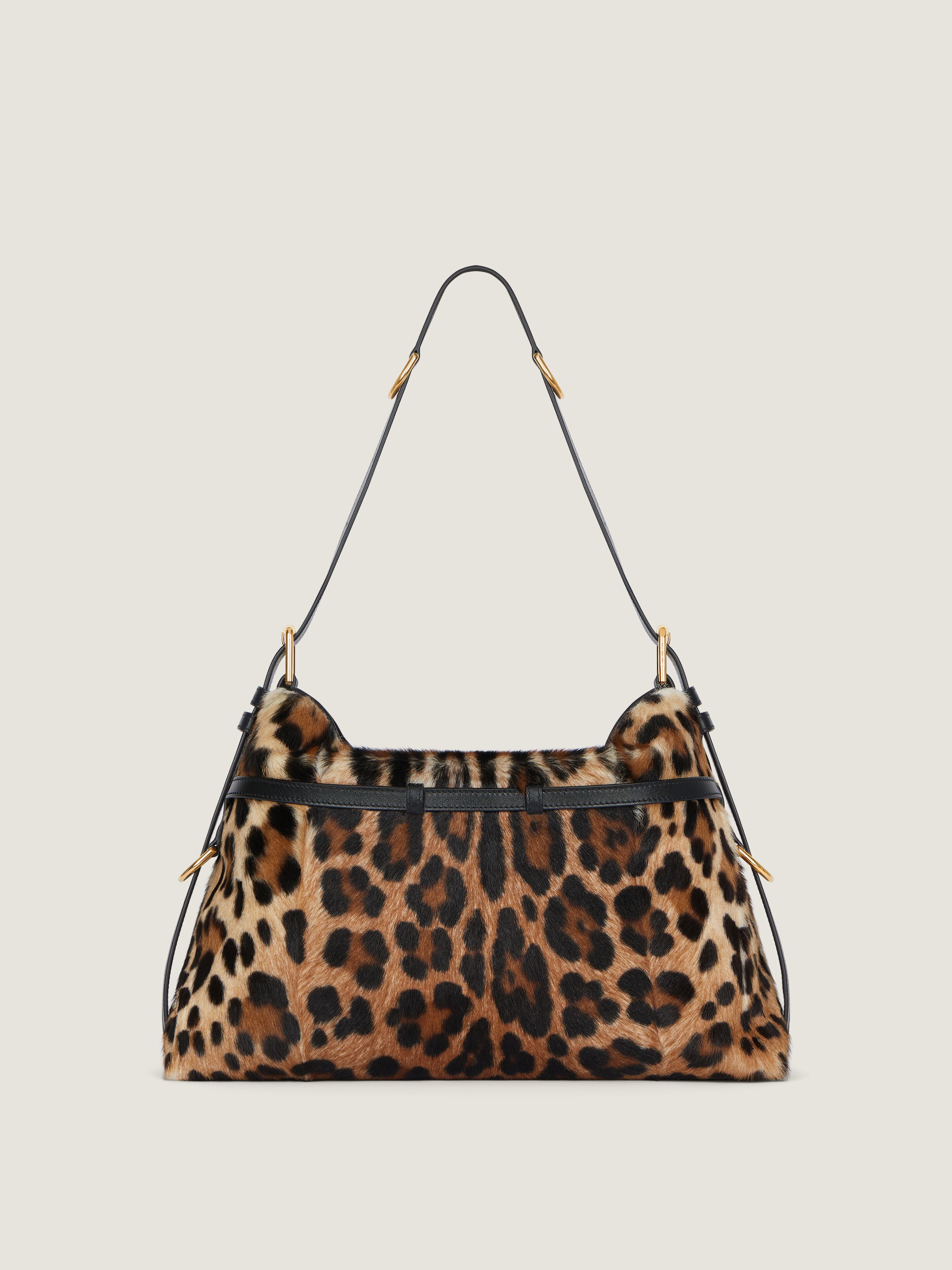 Medium Voyou bag in pony effect leather with leopard pattern in