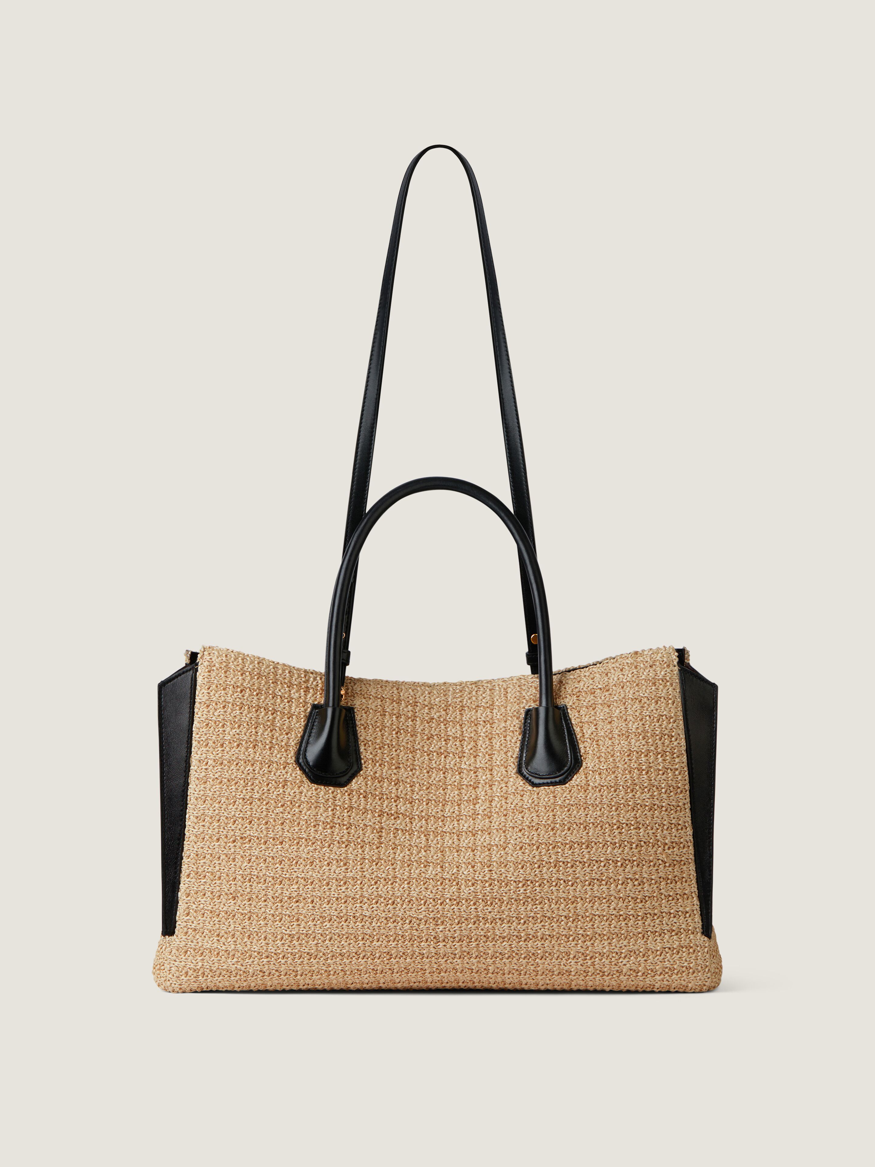 Medium Antigona Catchall raffia-effect bag in - natural