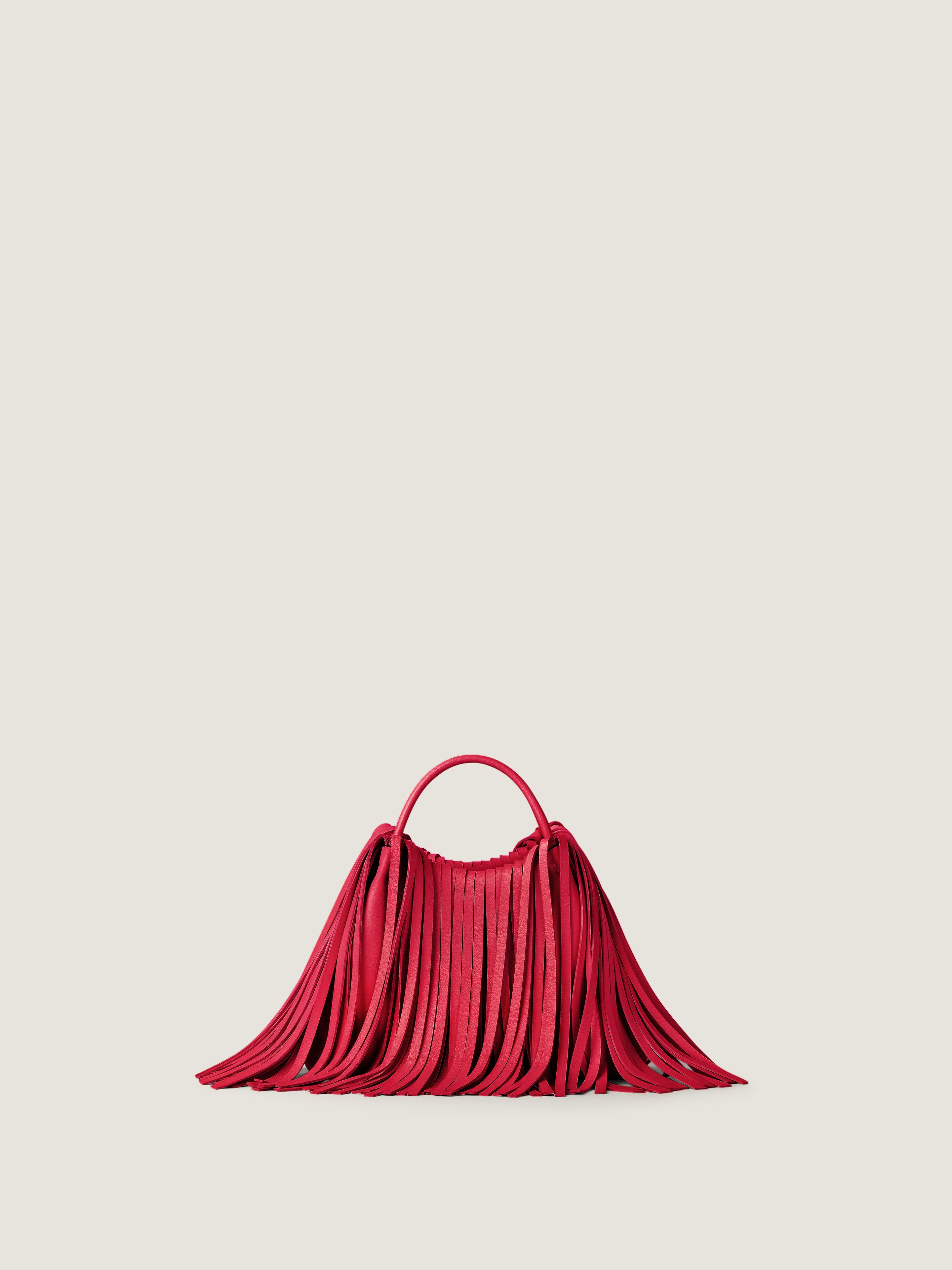 Nano Facet tote bag in leather with fringes in - equestrian red