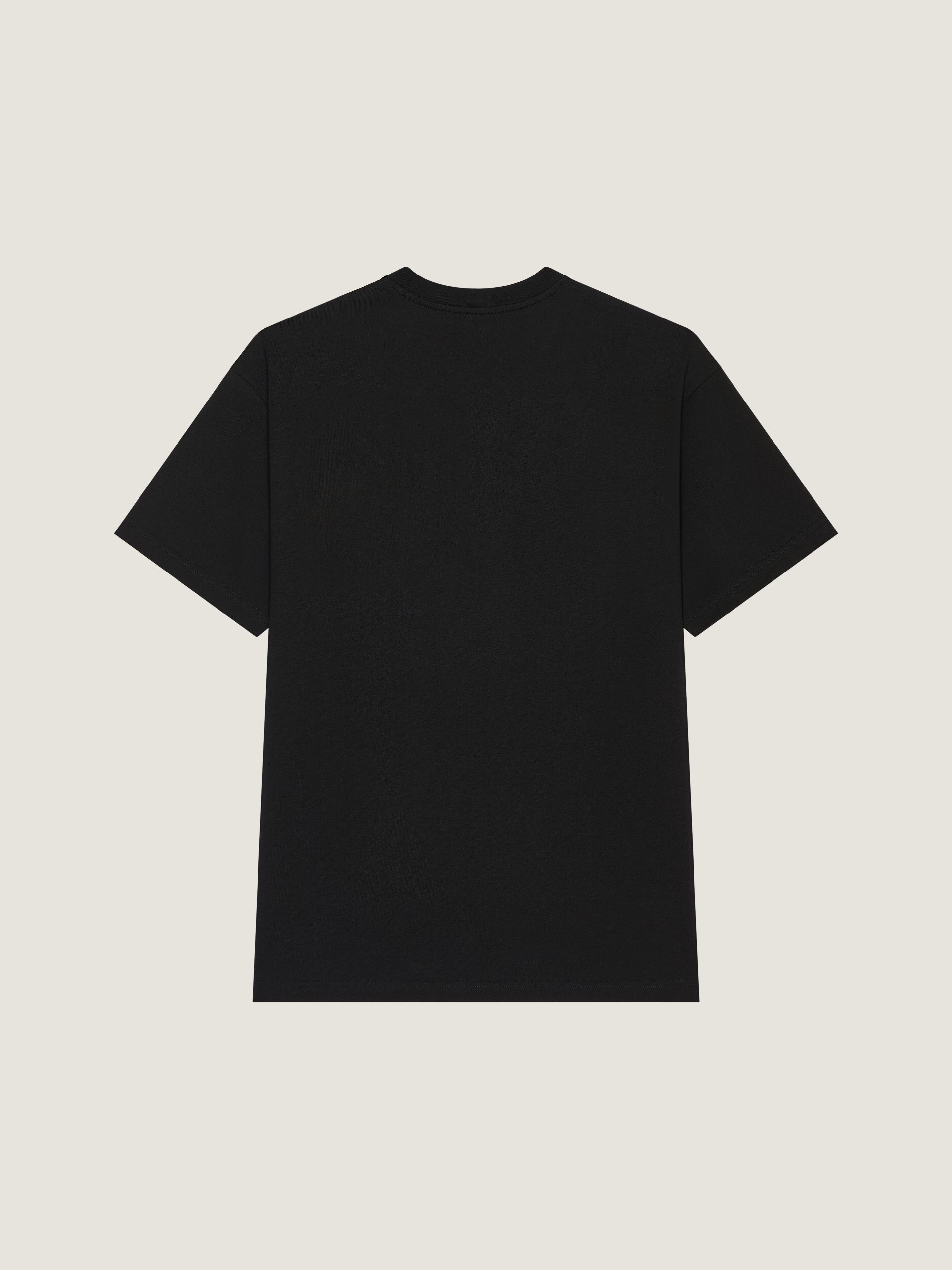 T-shirt in cotton with Givenchy Paris Paint print in - black