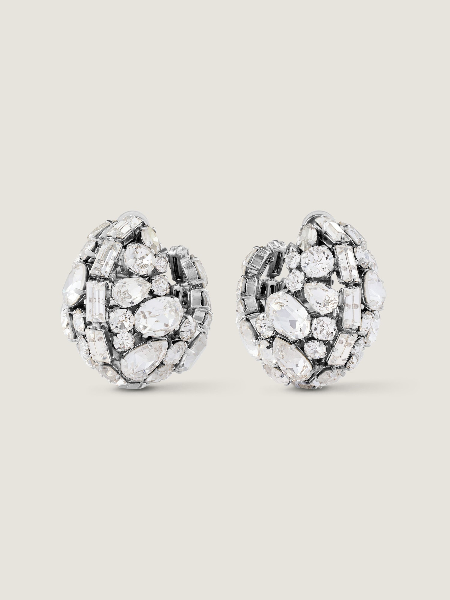 Bold Crystals clip earrings in metal and crystals