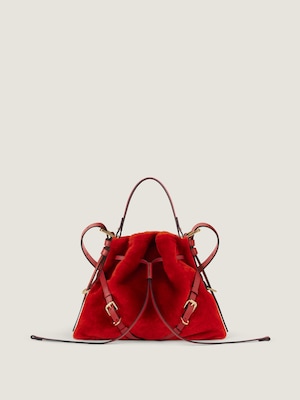 Small Voyou Bucket bag in shearling