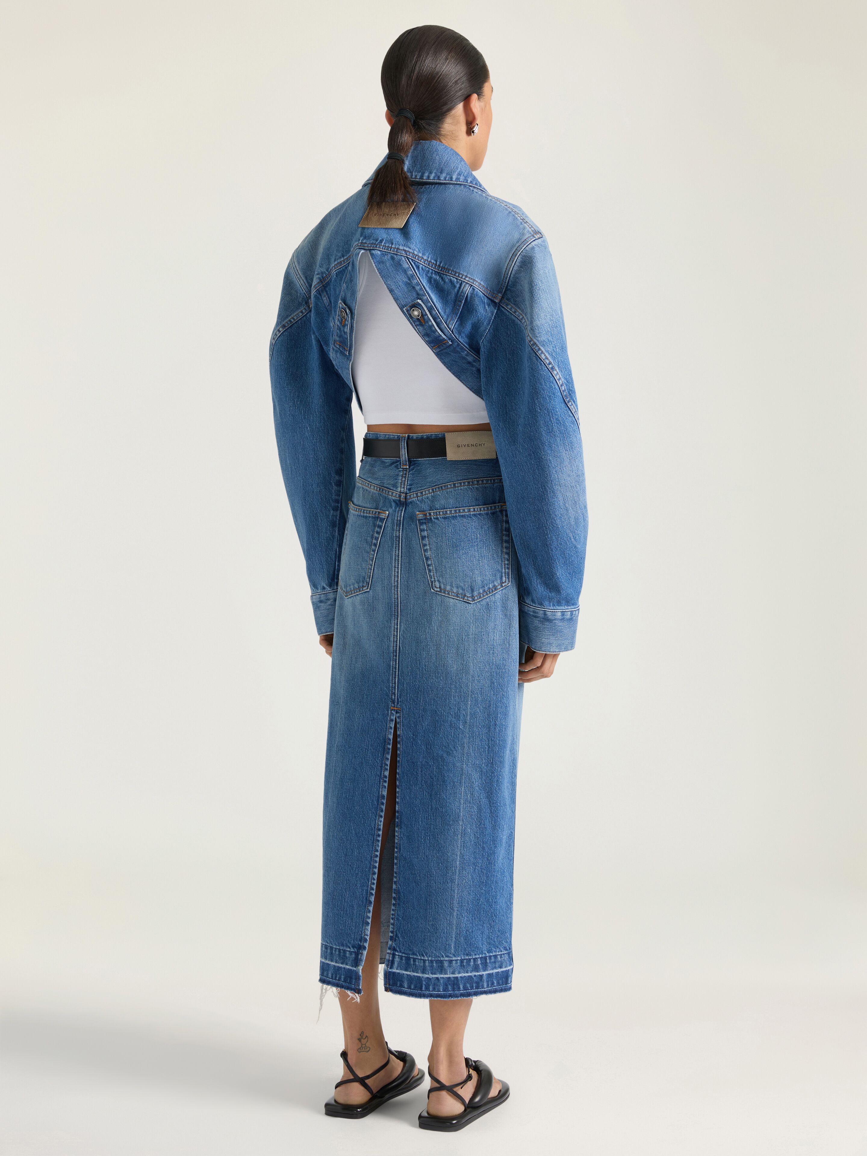 Cropped opened back jacket in medium blue denim in - medium blue