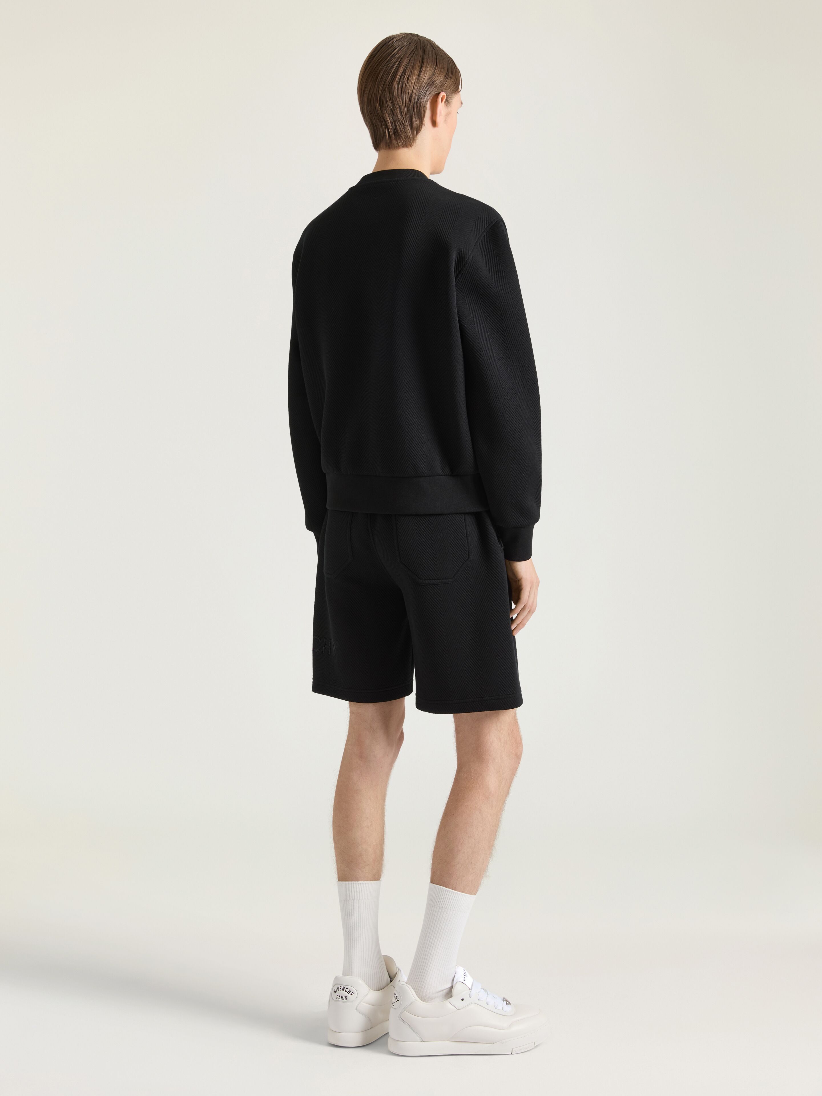 Herringbone knit sweatshirt with Givenchy jacquard in - black