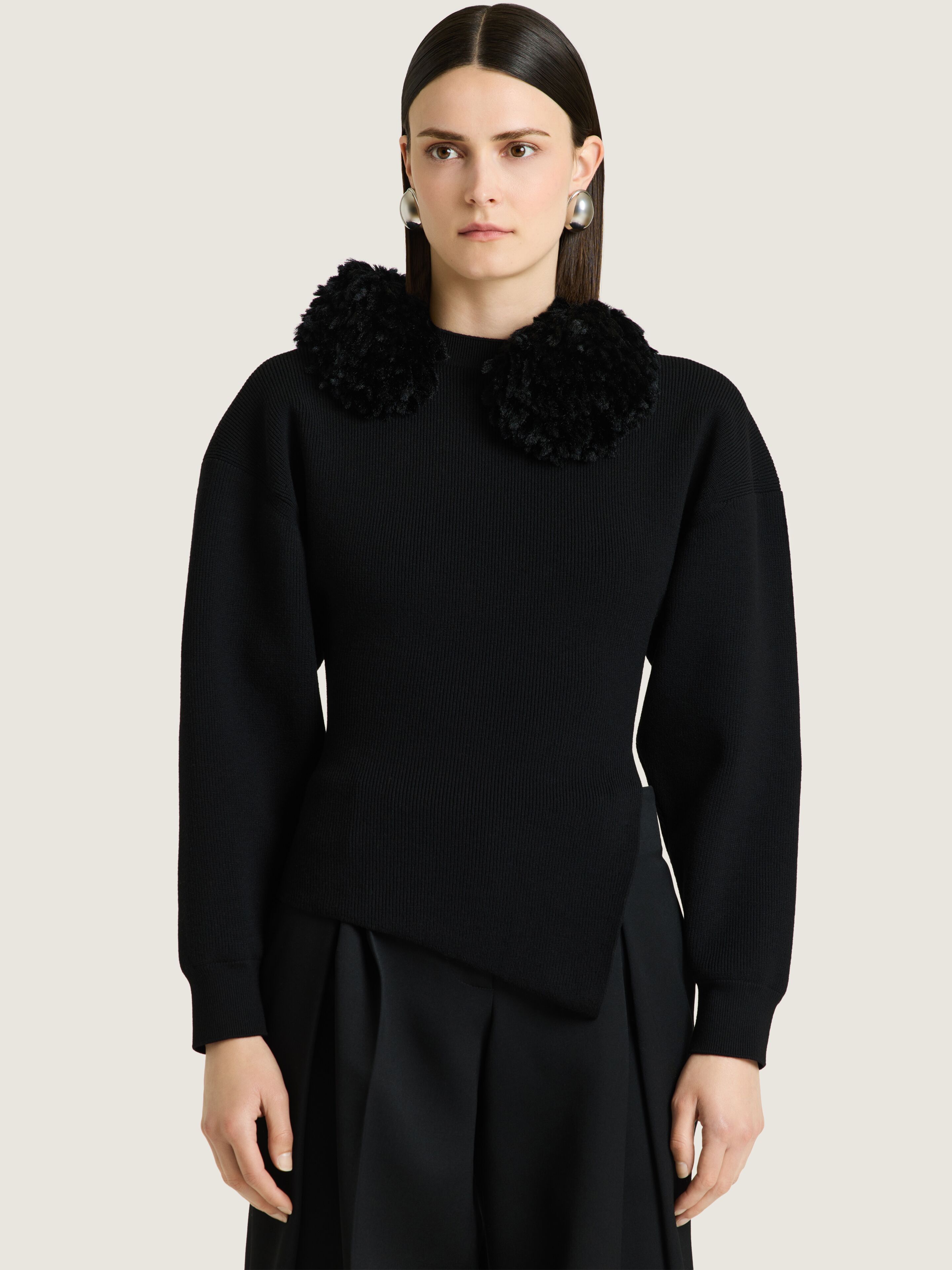 Asymmetric sweater in wool with pompoms in - black - BW90XC4ZVY