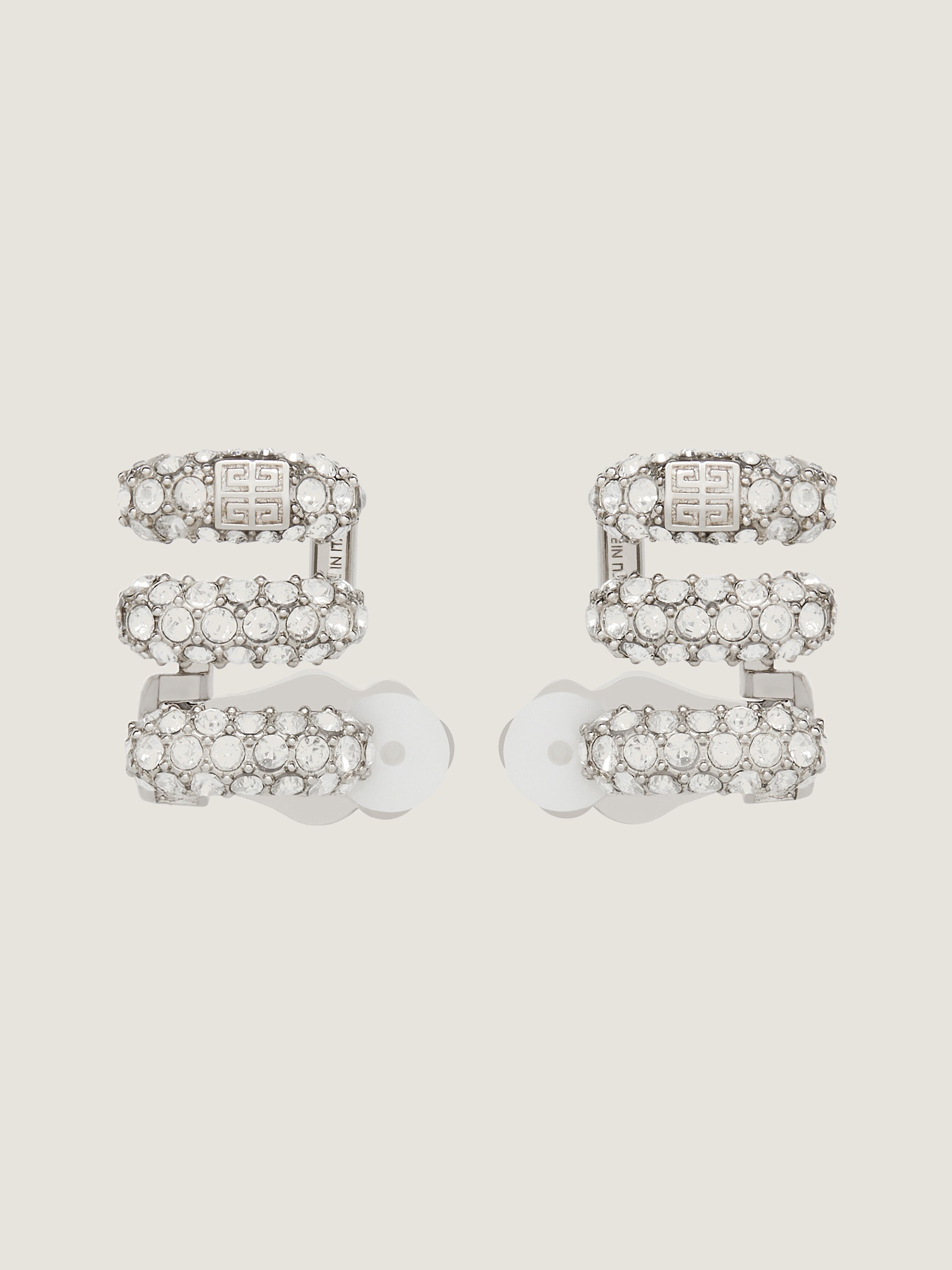 Stitch clip earrings in metal with crystals in - silvery