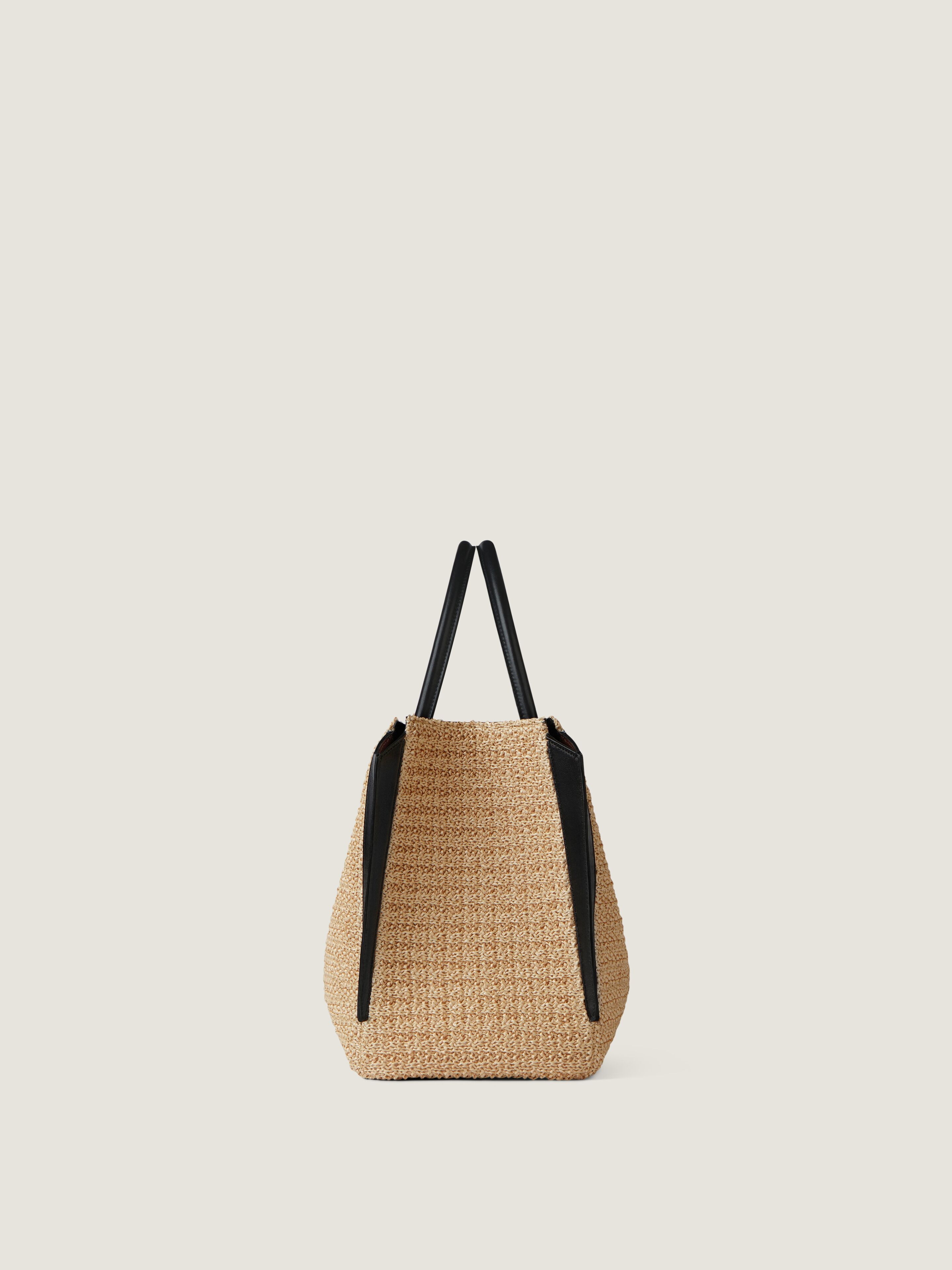 Medium Antigona Catchall raffia-effect bag in - natural