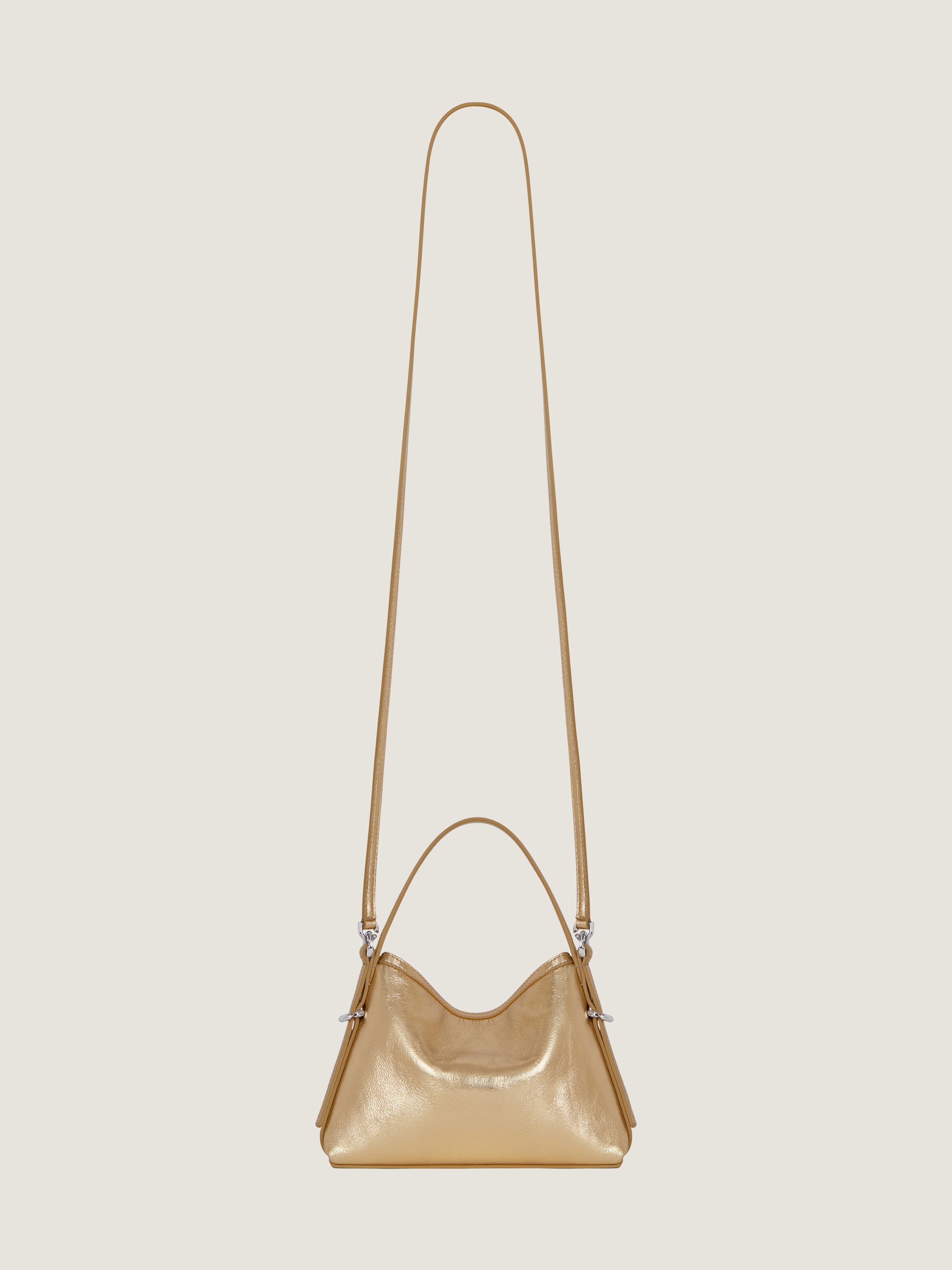Nano Voyou bag in laminated leather in - golden sand
