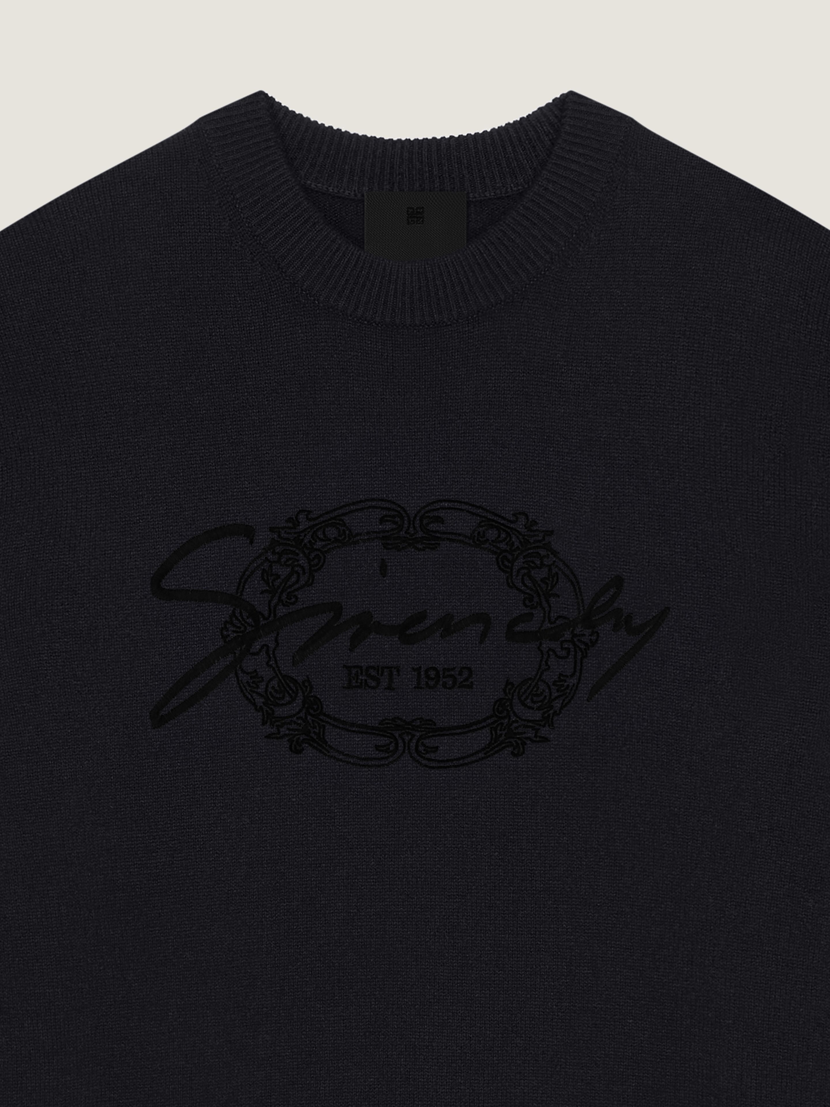 Sweater in wool with GIVENCHY medallion in - black | Givenchy US