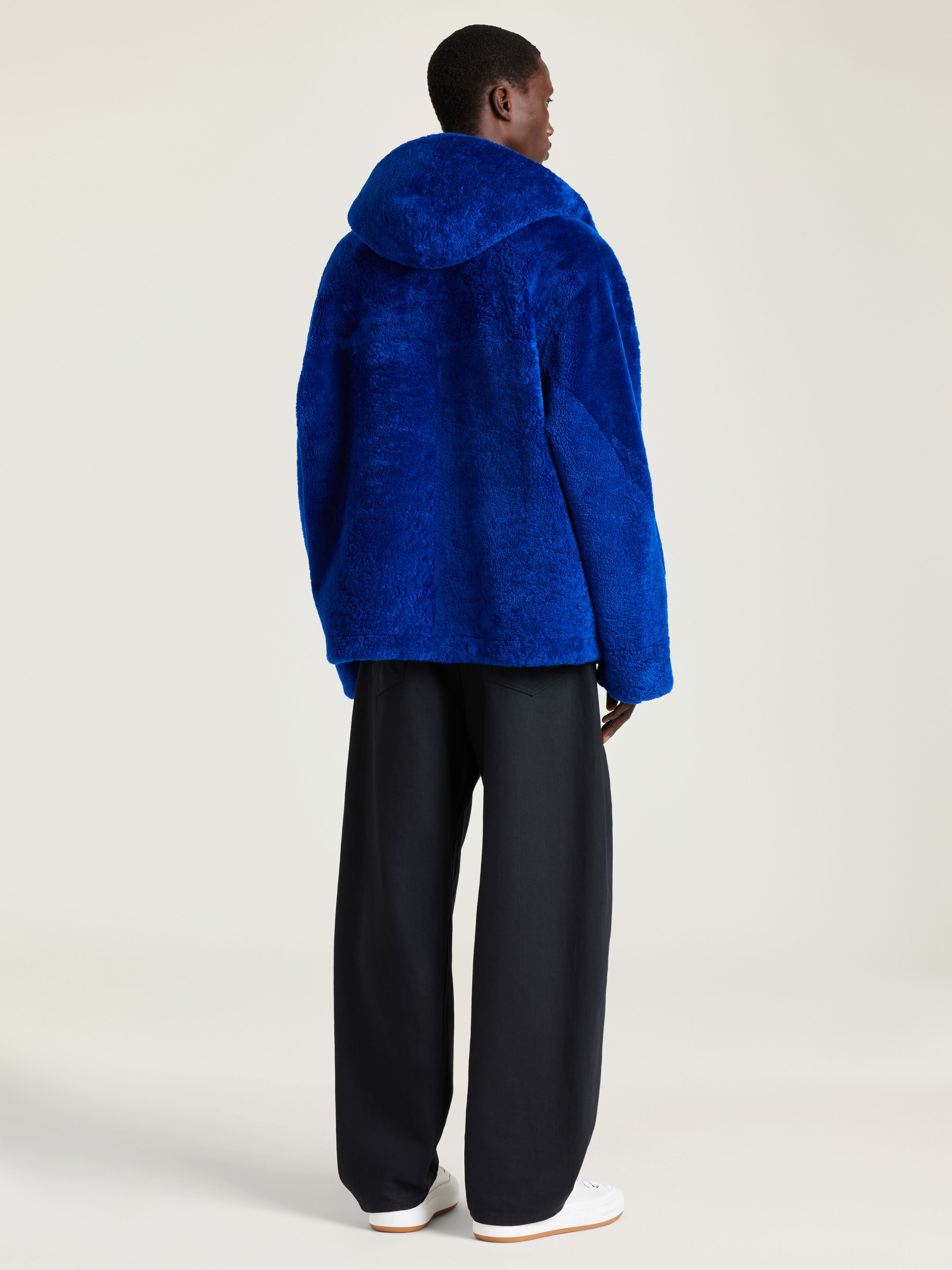 Zipped hoodie in shearling with leather pocket | Givenchy US