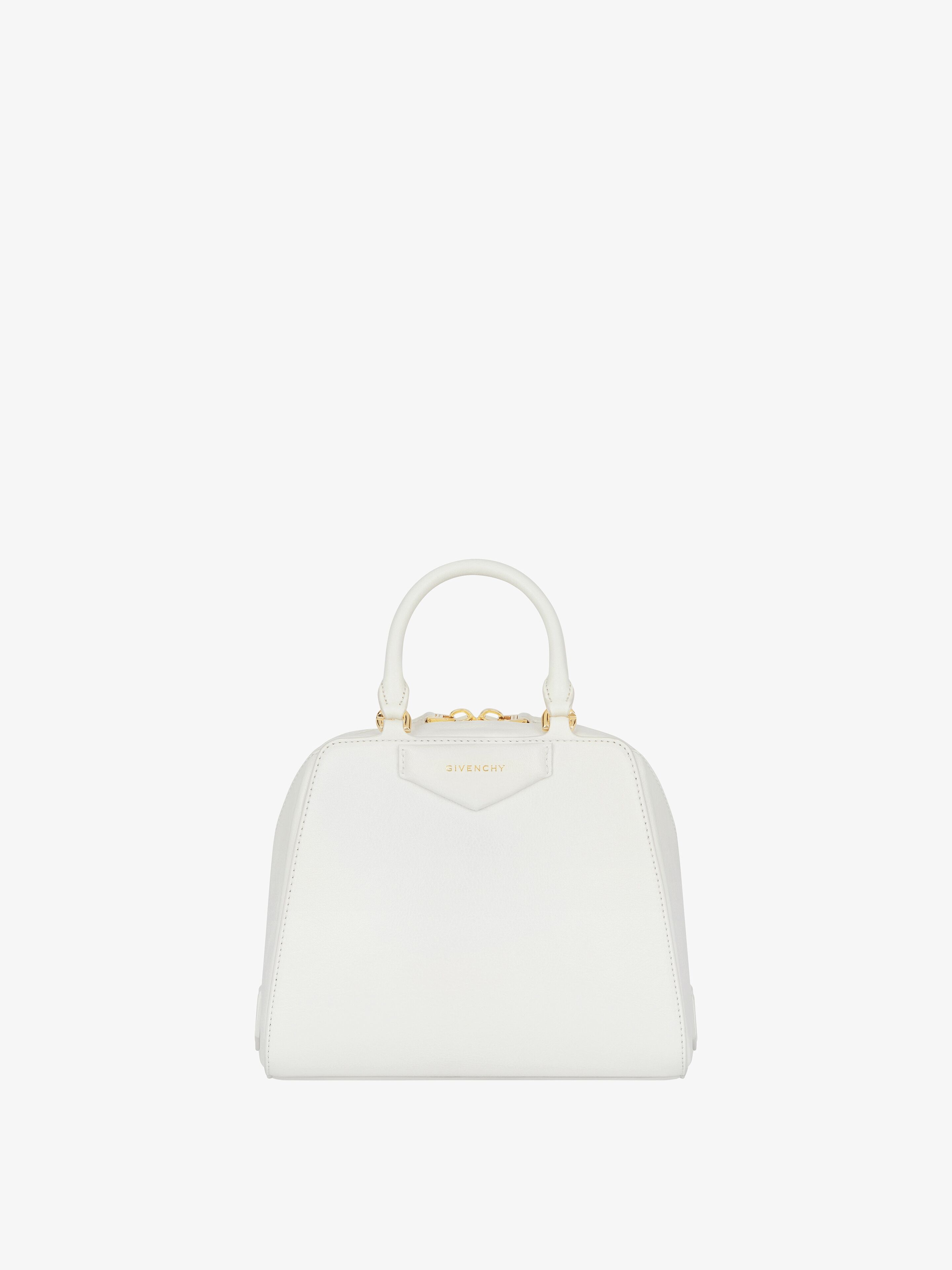 Shop Givenchy Mini Antigona Cube Bag In Leather In Gold
