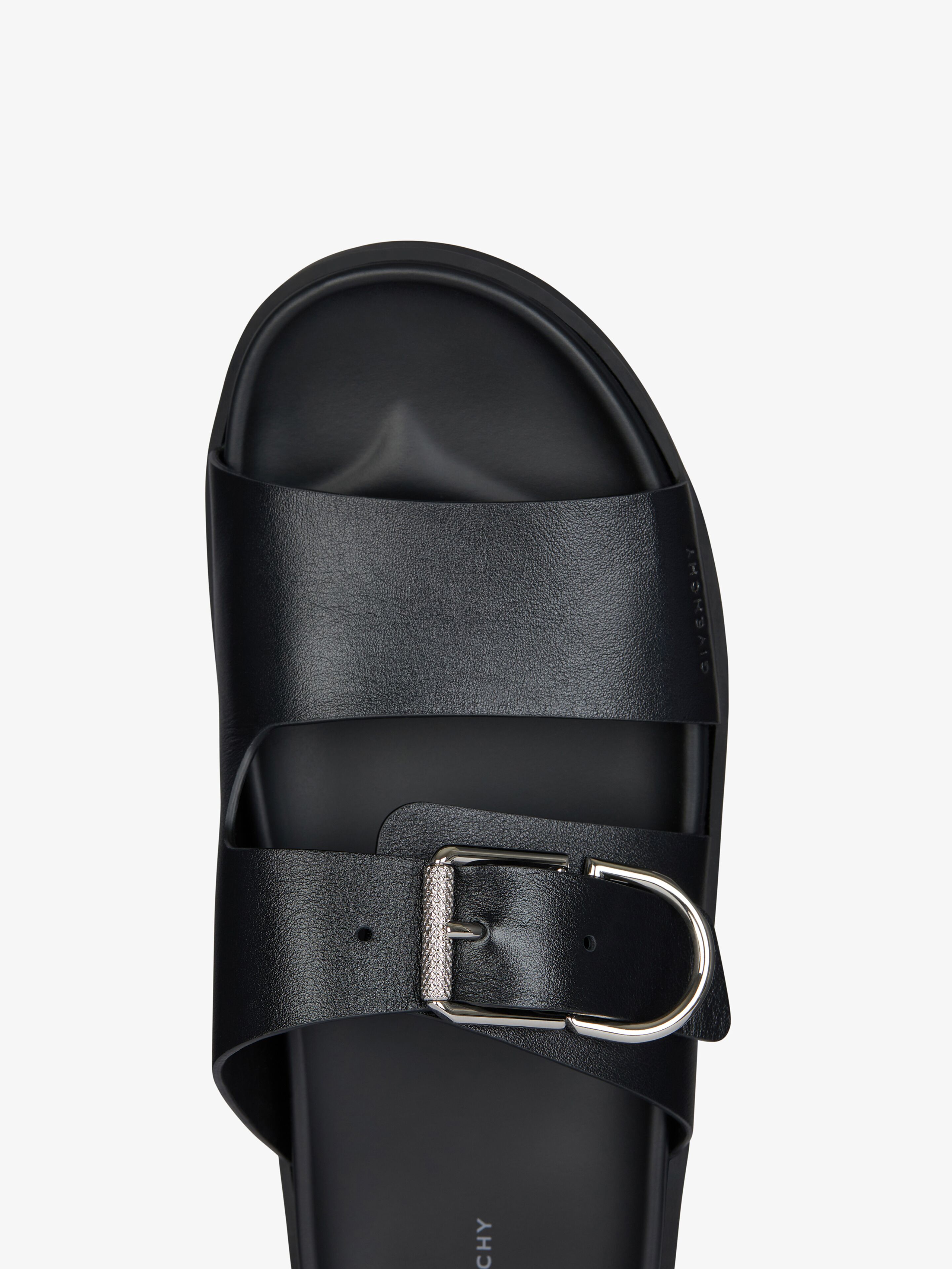 Voyou flat mules in grained leather | Givenchy CA | Givenchy
