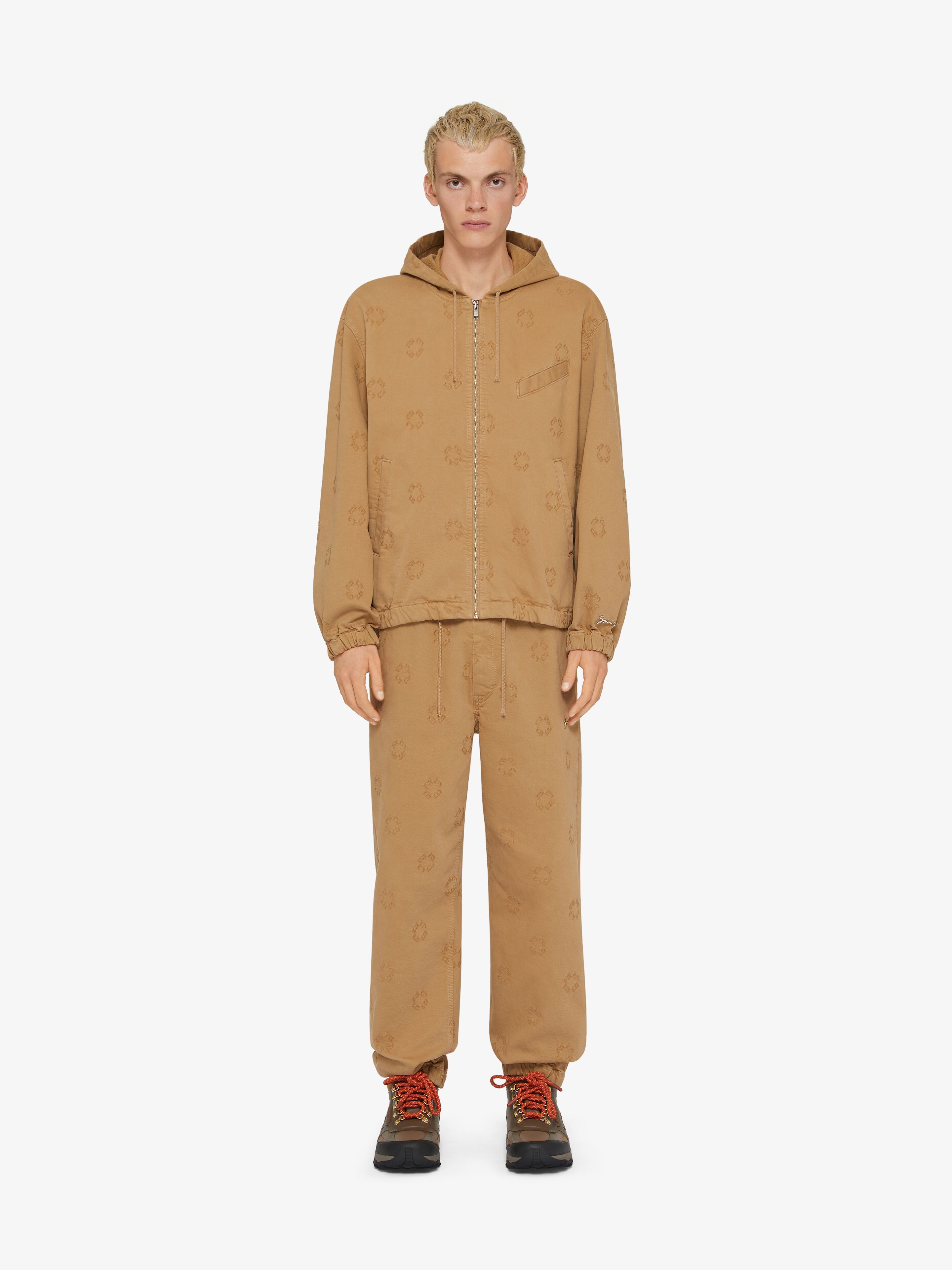 Jogger pants in monogram 72 denim in - beige | Givenchy US