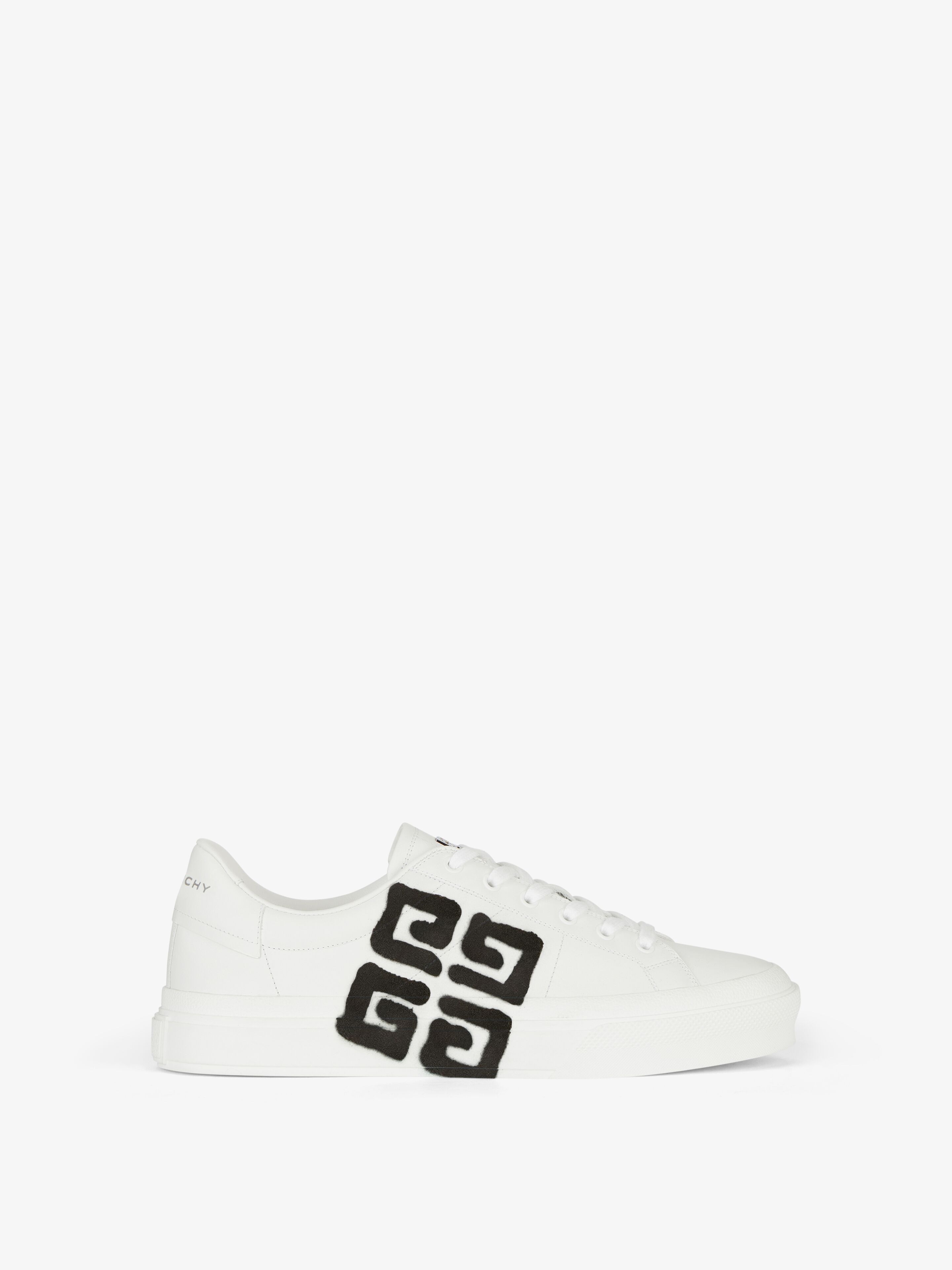 Shop Givenchy City Sport Sneakers In Leather With Tag Effect 4g Print In White/black