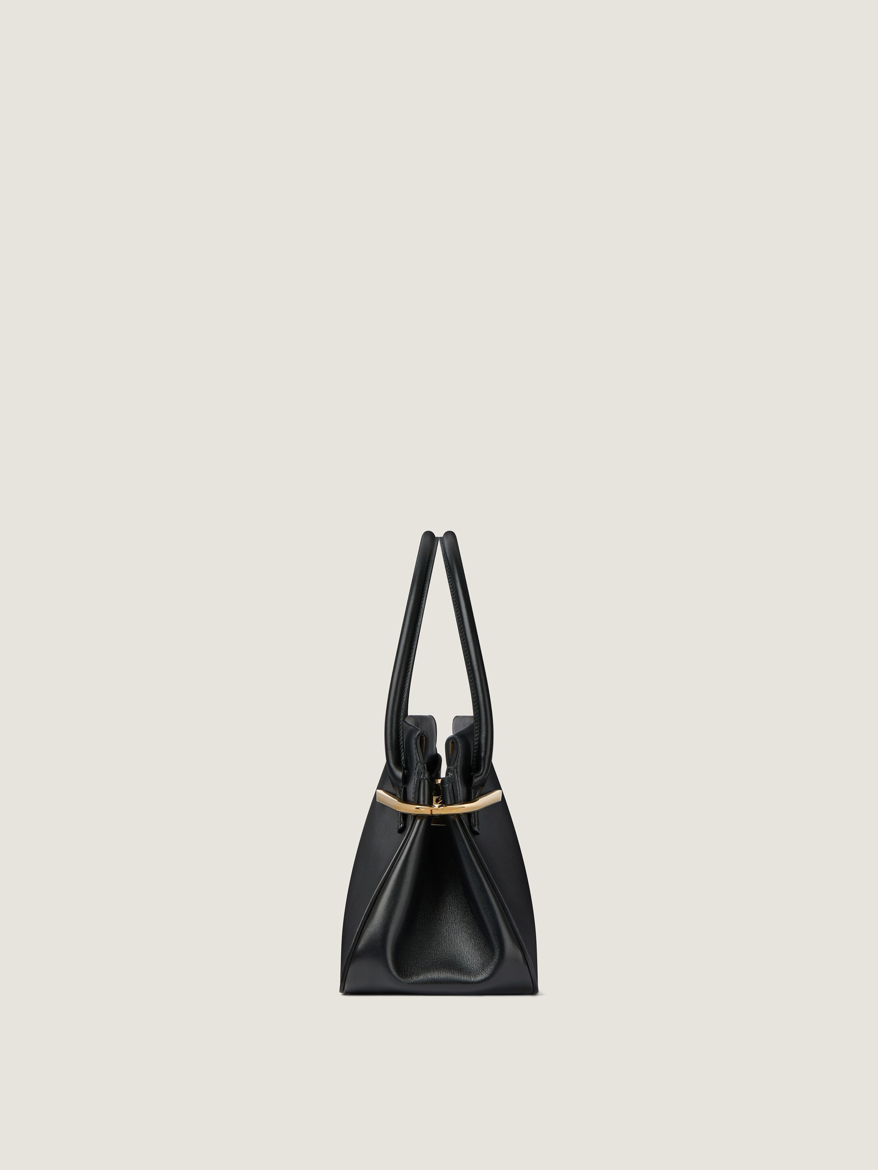 Medium Pinch bag in leather in - black | Givenchy US