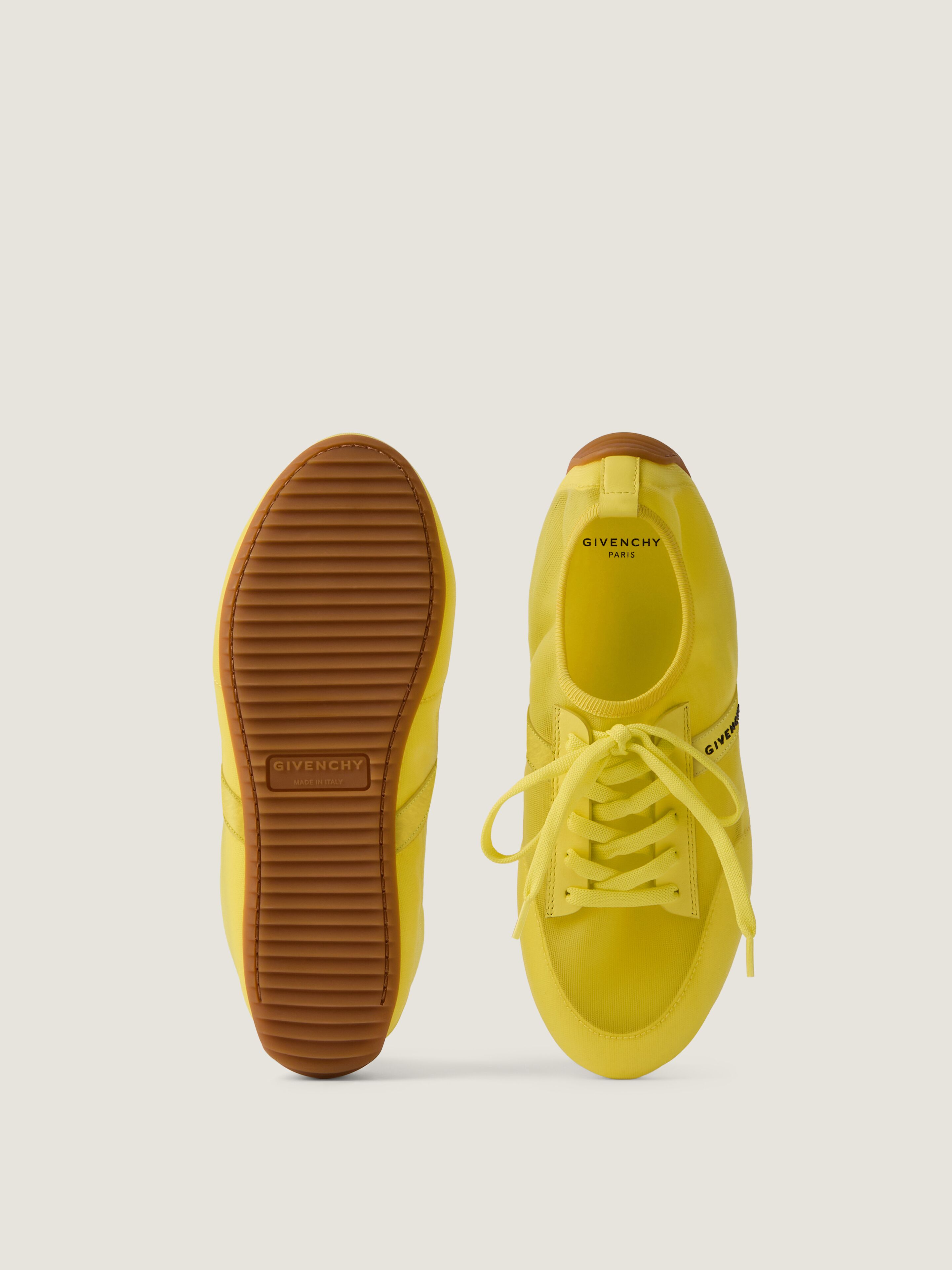 Slim sneakers in transparent mesh and leather in - acid yellow